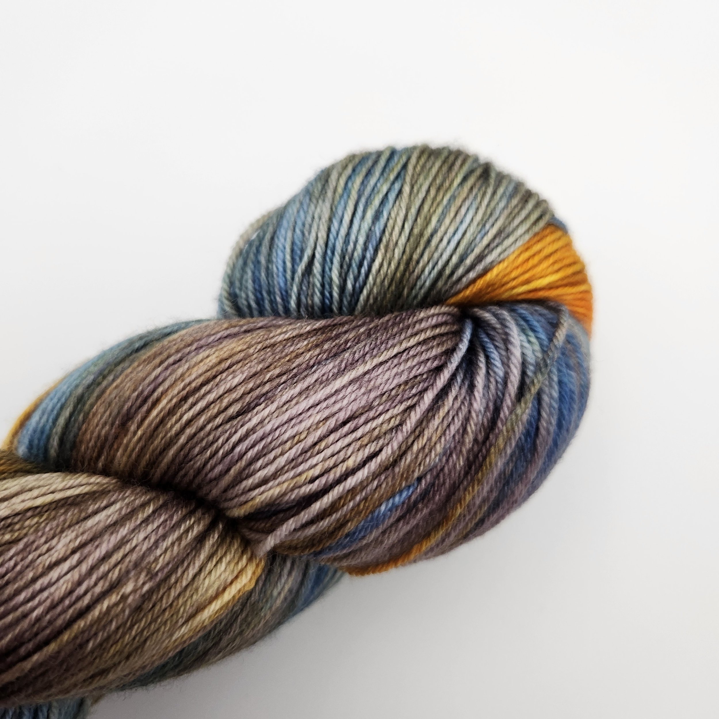 Close-up of fibres and colour in Fiori hand dyed sock yarn, Winter Sunrise.