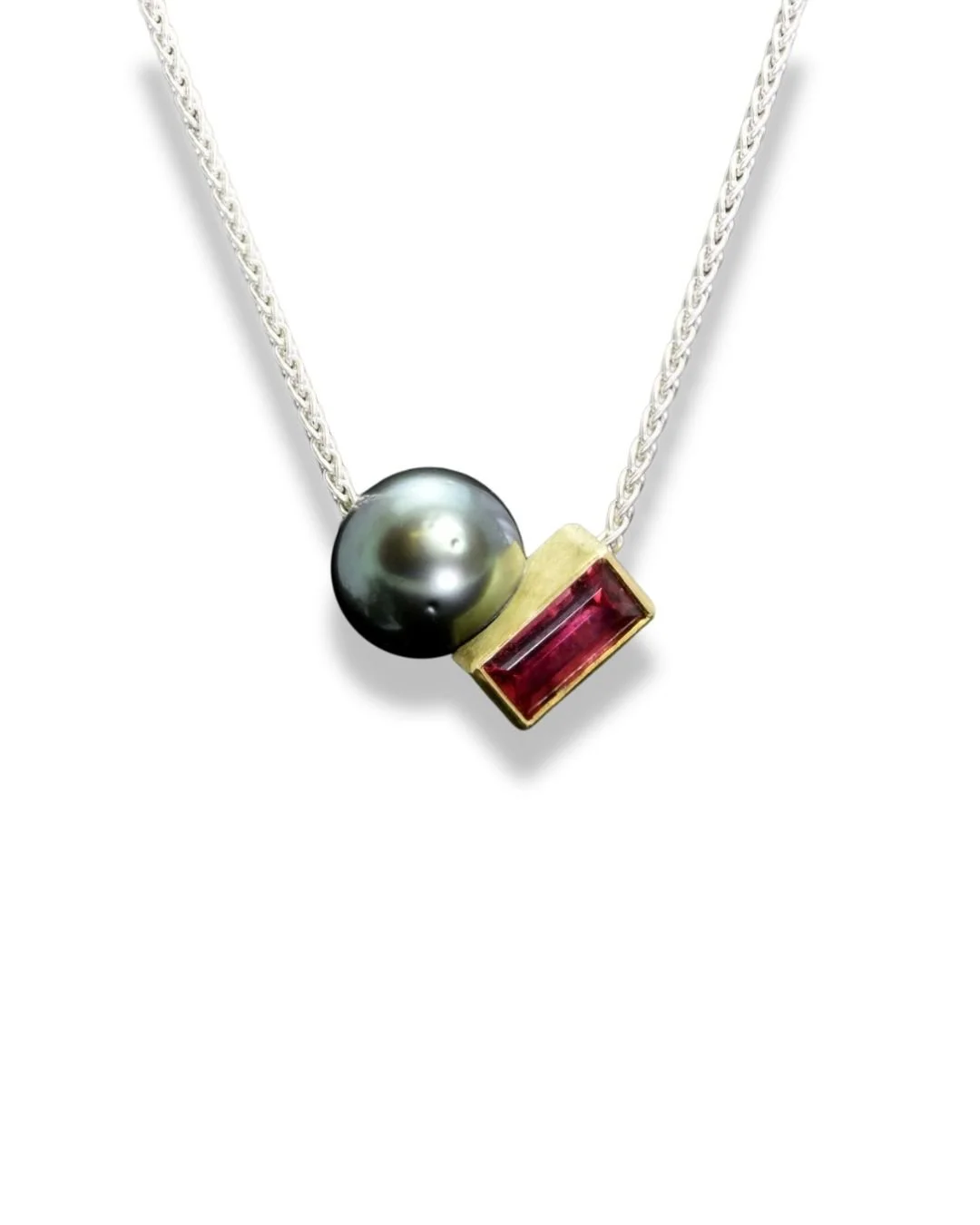 Necklace with a South Sea Pearl and Gold-Set Tourmaline.