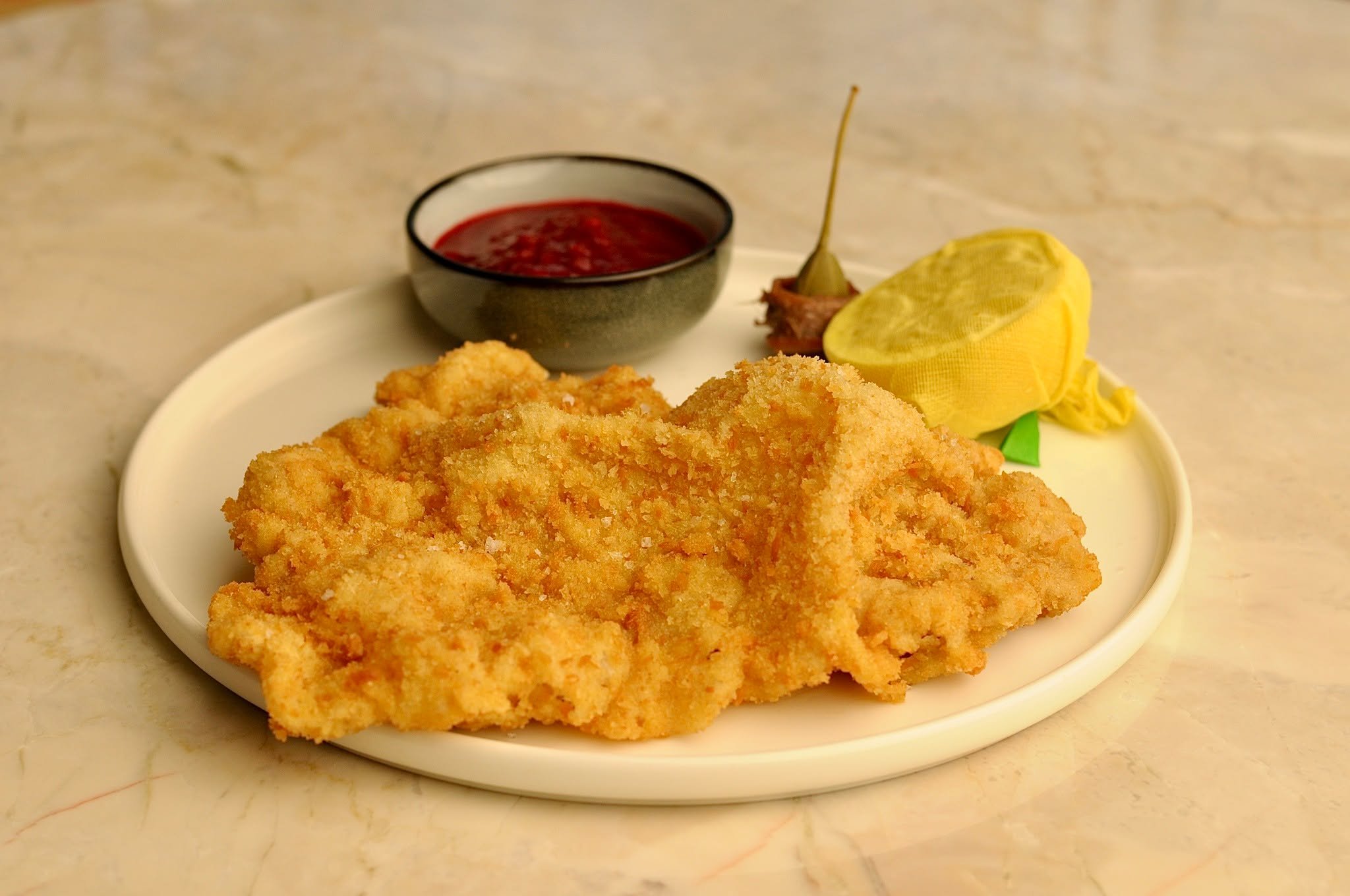 The simple classics, done to perfection &ndash; our all-time favourite: the Wiener Schnitzel. 🍋🌟

#Wienerschnitzel #ClassicCuisine #GourmetDining #TraditionalFlavours #Z&uuml;ri #FoodieHeaven #ComfortFood #SILKRestaurant #FineDining #Foodstagram #I