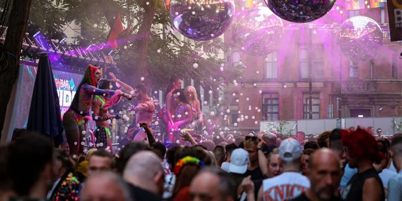 This image shows a scene from the Manchester Pride celebration