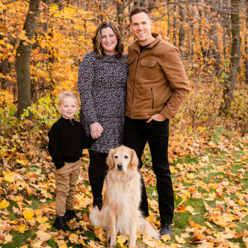 Dr. Dani Hahn with her family and their dog Ivy