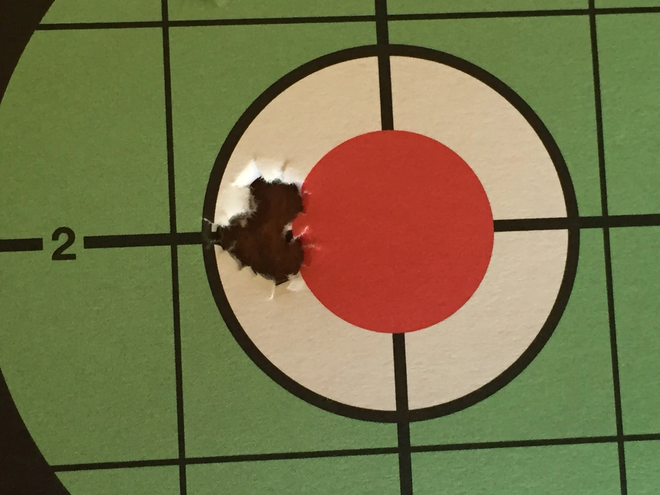 6PPC, 5 Shot Grouping at 100 yards with all bullet impact points touching