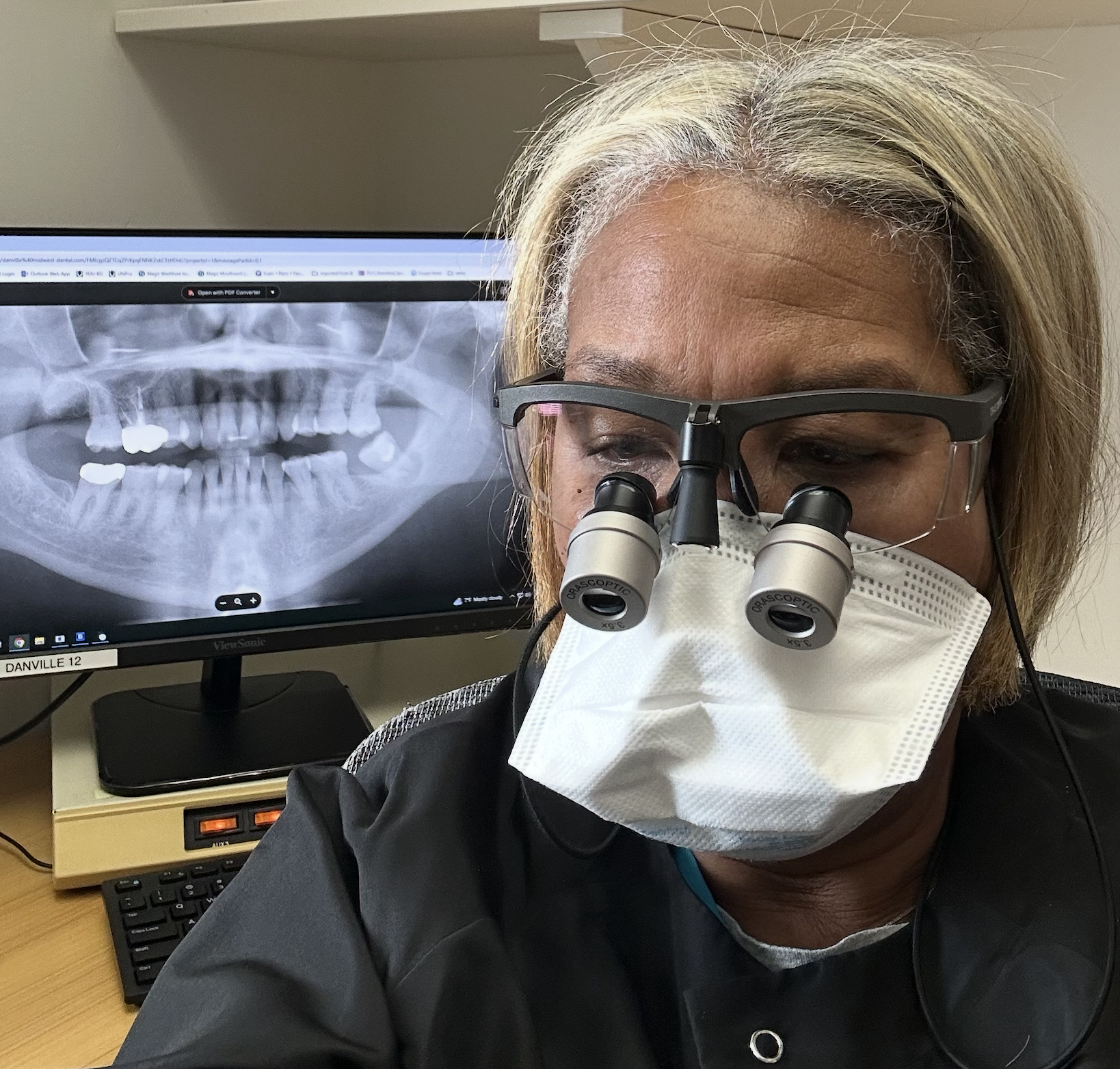 Dr Cassandra Hodges working as dentist