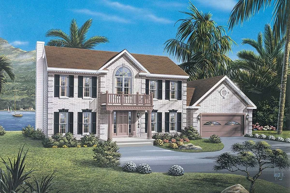 A two-story house with white brick exterior, dark shutters, and a brown shingle roof surrounded by palm trees and landscaped garden.