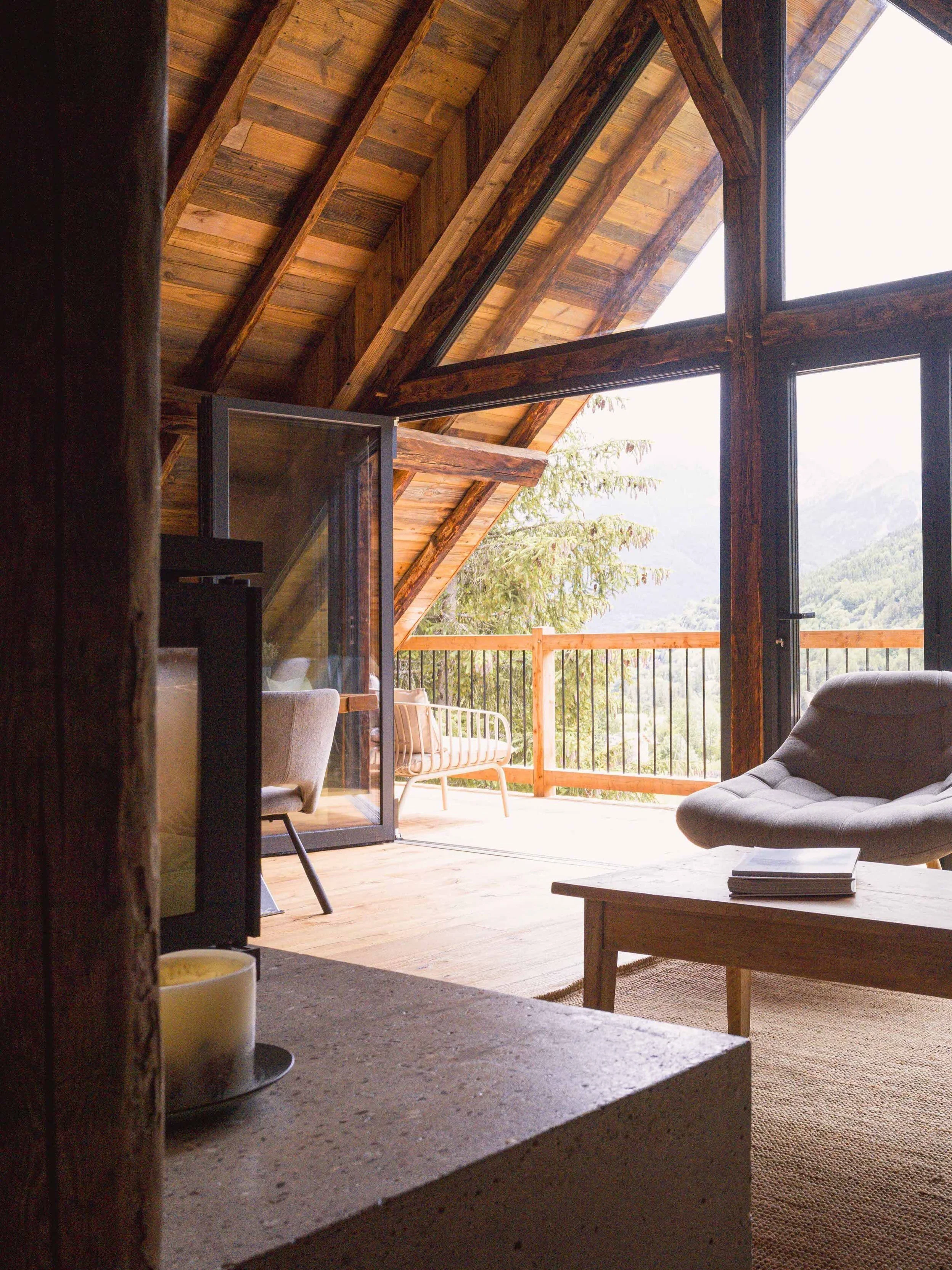 For a hundred years, this barn kept hay through the winter.
Now it keeps families.

The Haybarn, Serre Chevalier. Four ensuite bedrooms for eight to ten, a table that seats twelve, a wood-burner doing what wood-burners do, and a south-facing balcony 