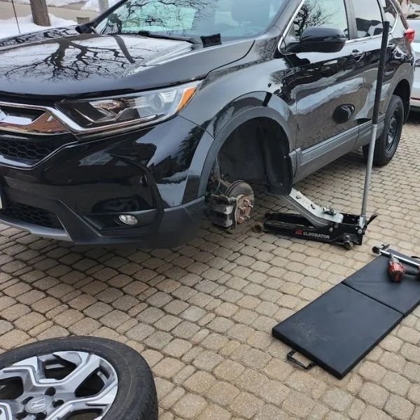 Providing mobile tire change at home in Pickering, Ontario.