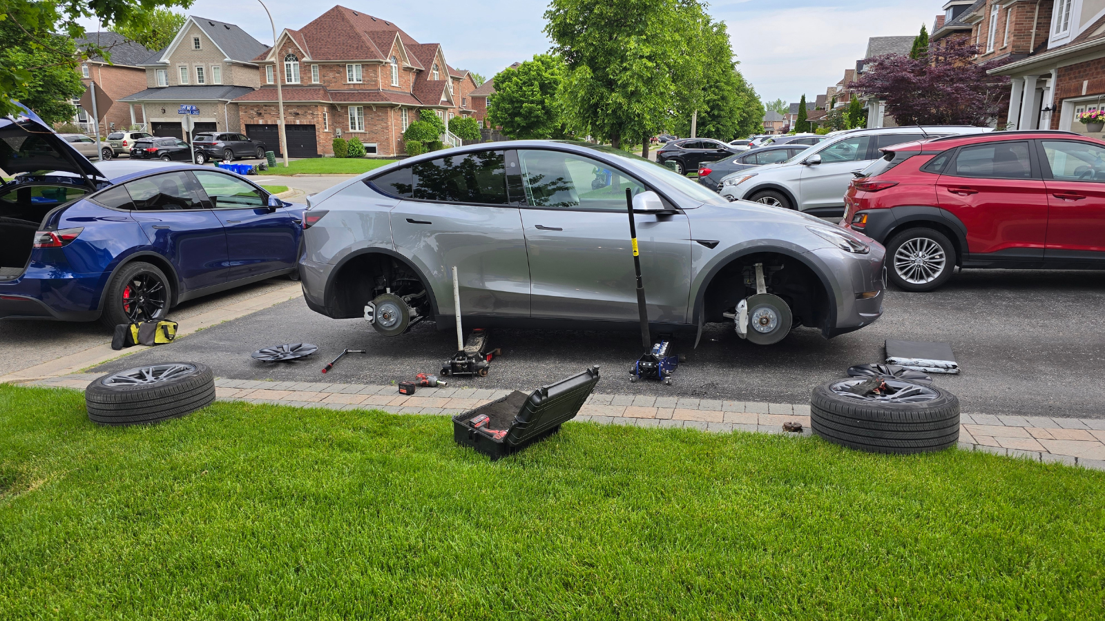 Rotating tires for a Tesla in the Greater Toronto Area.