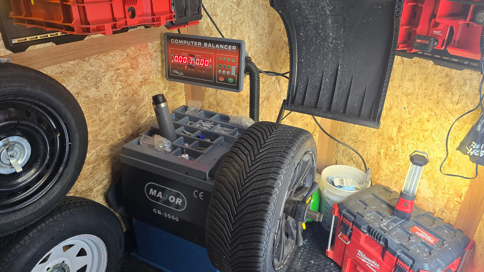 Balancing a Tesla wheel on our high precision balancer in our mobile trailer shop.