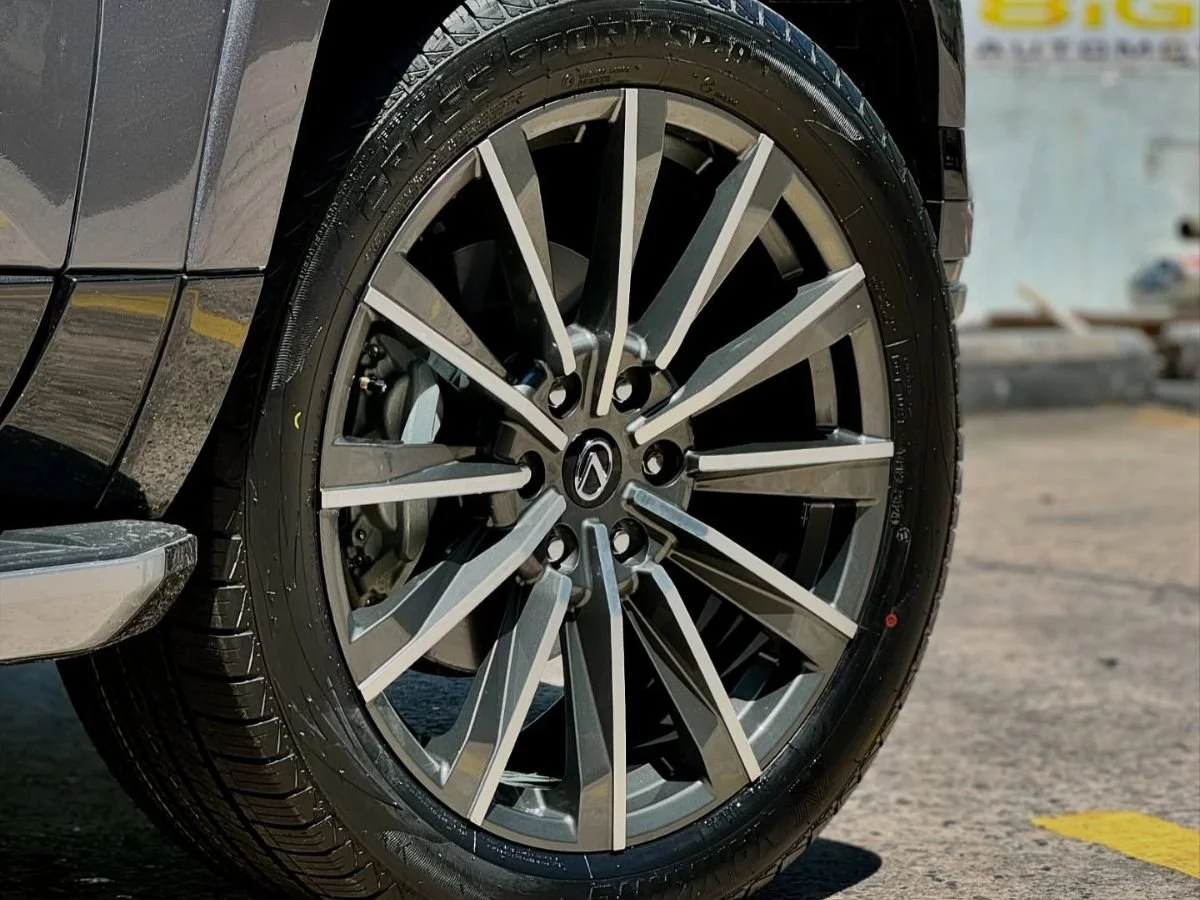 Nankang Sportnex tire on a multi-spoke Lexus alloy wheel, showing high-performance tread detail.