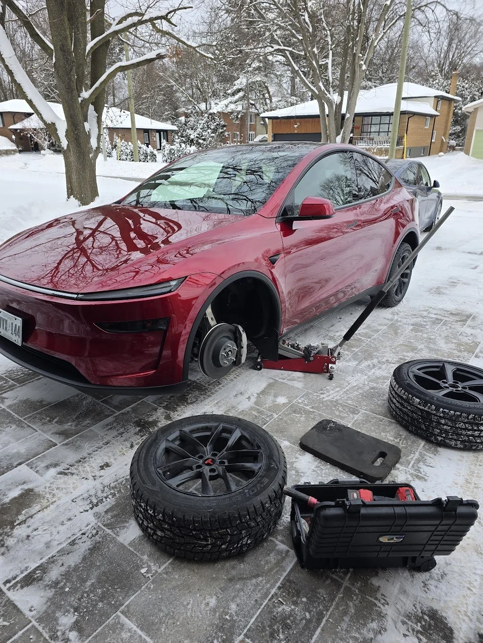 Installing an 18 Inch Tesla Model Y winter tire package for a customer, in the GTA - in the driveway, at home!
