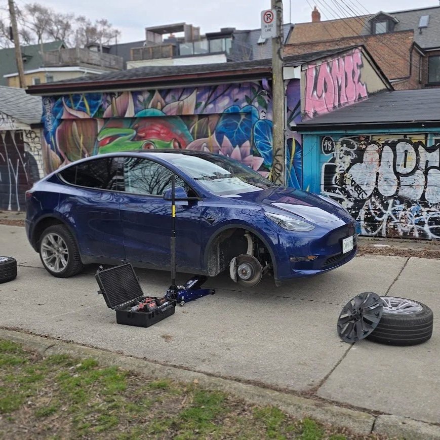 Providing mobile tire change at home in Toronto, Ontario.