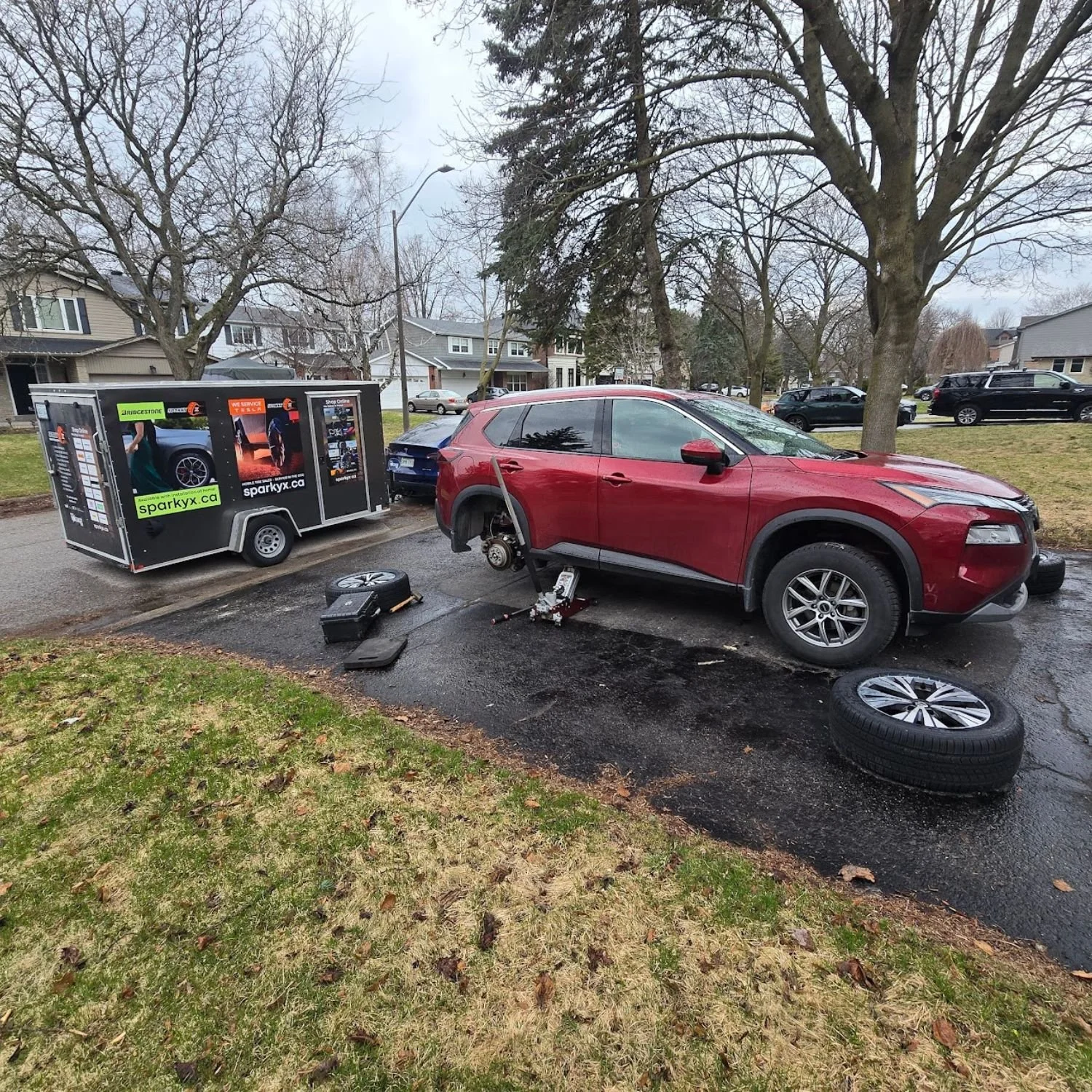 Mobile tire service in a Markham driveway.