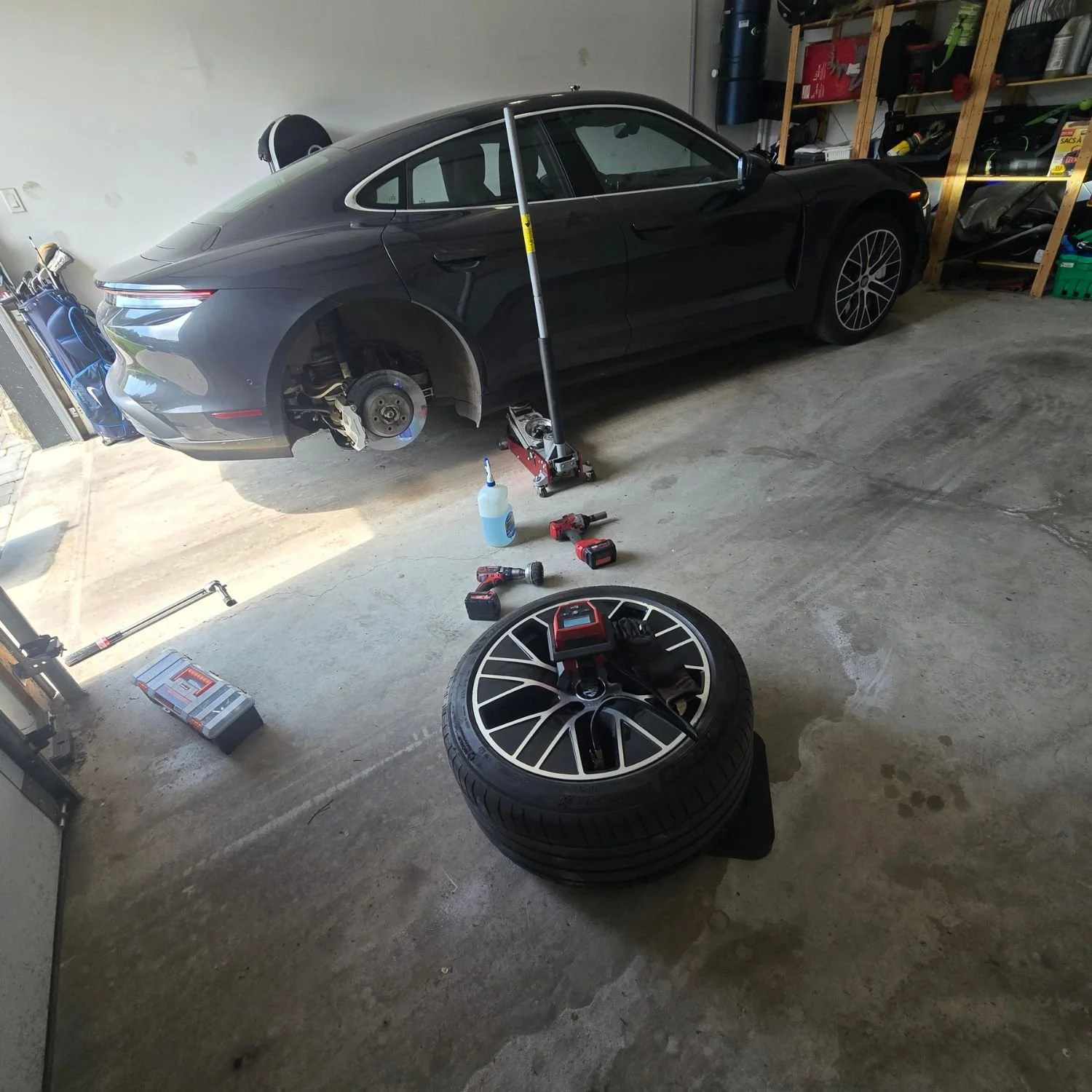 Testing a repaired tire before re-installing the wheel.