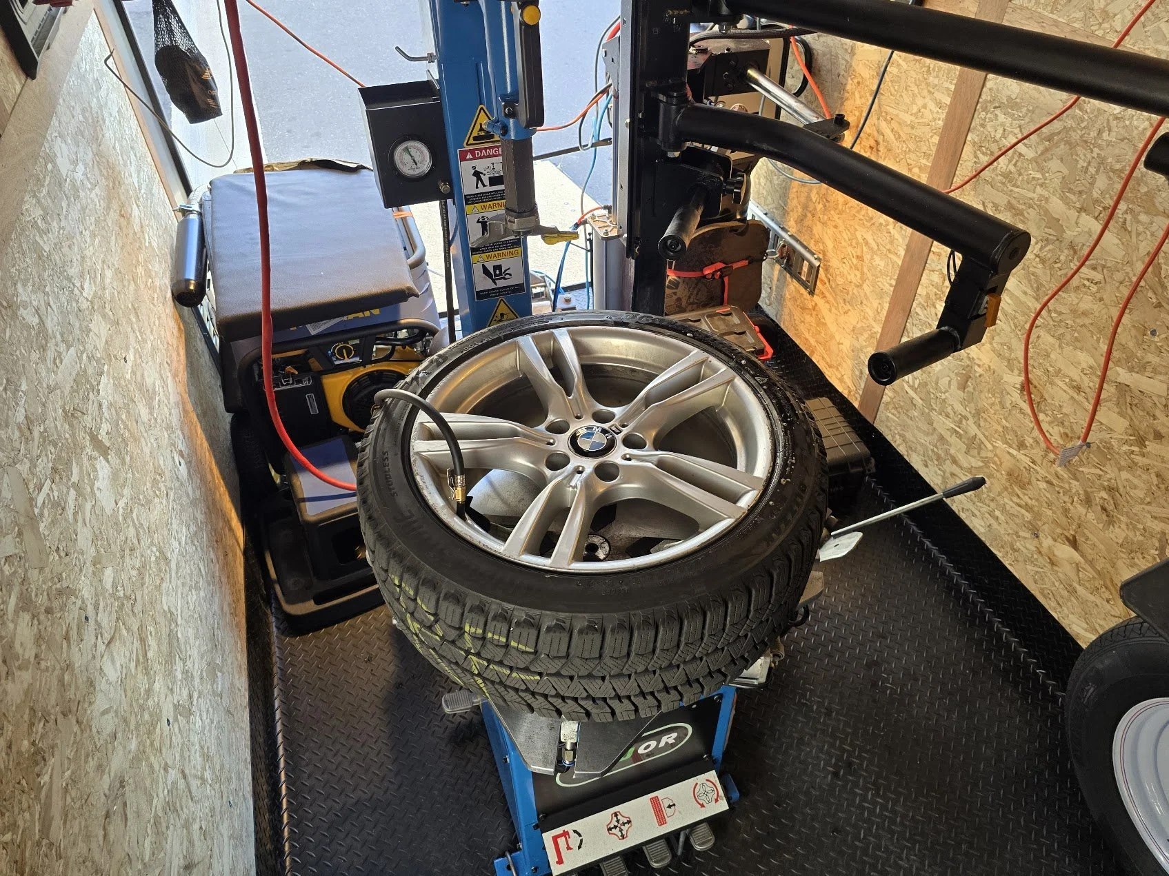 Our mobile tire shop in a spacious trailer with all high performance tire changing machines, compressors, wheel balancers and power generator for remote areas.