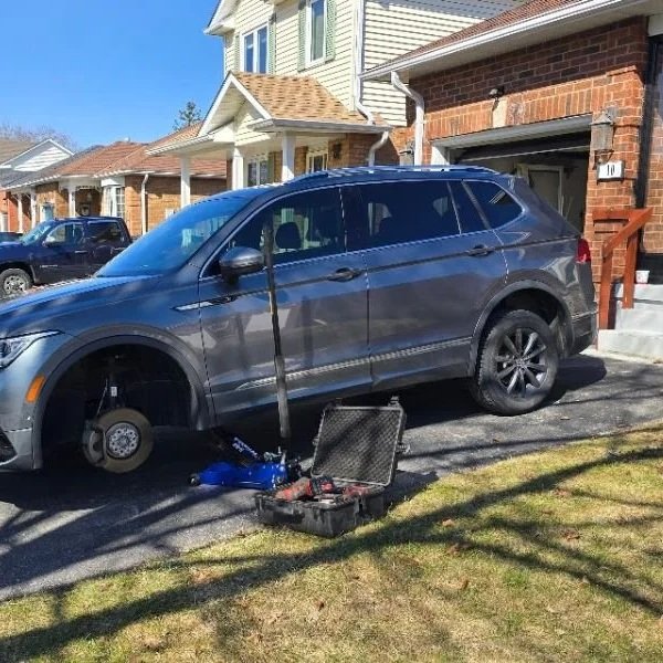 Providing seasonal tire change at home in Courtice, Ontario.