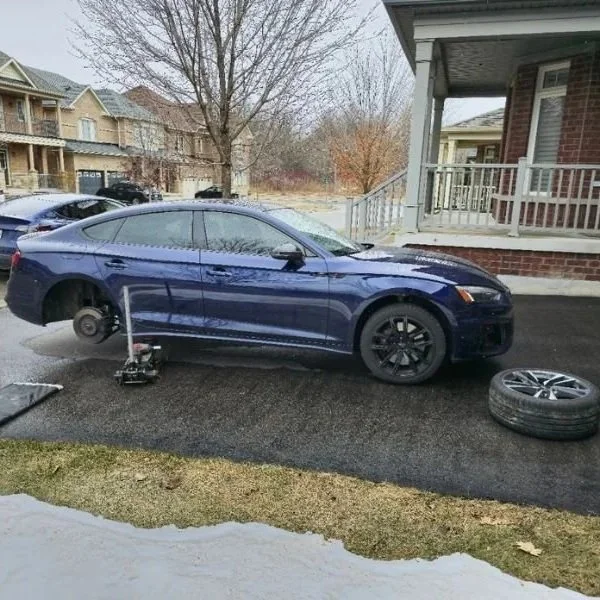 Providing seasonal tire change at home in Markham, Ontario.