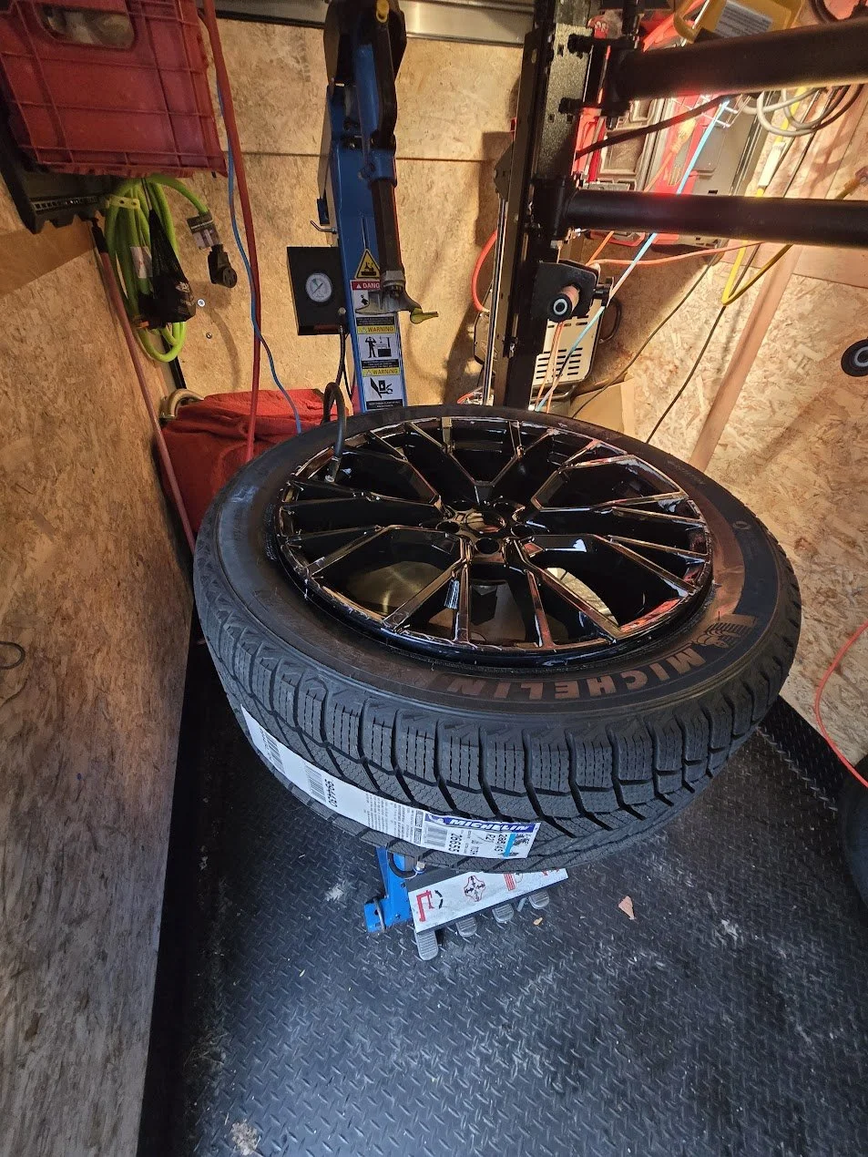 New tires and rims purchased from Sparky X delivered and installed for a valued customer at home.