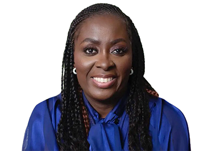 Portrait of a smiling woman with dark braided hair, wearing a blue outfit and earrings.