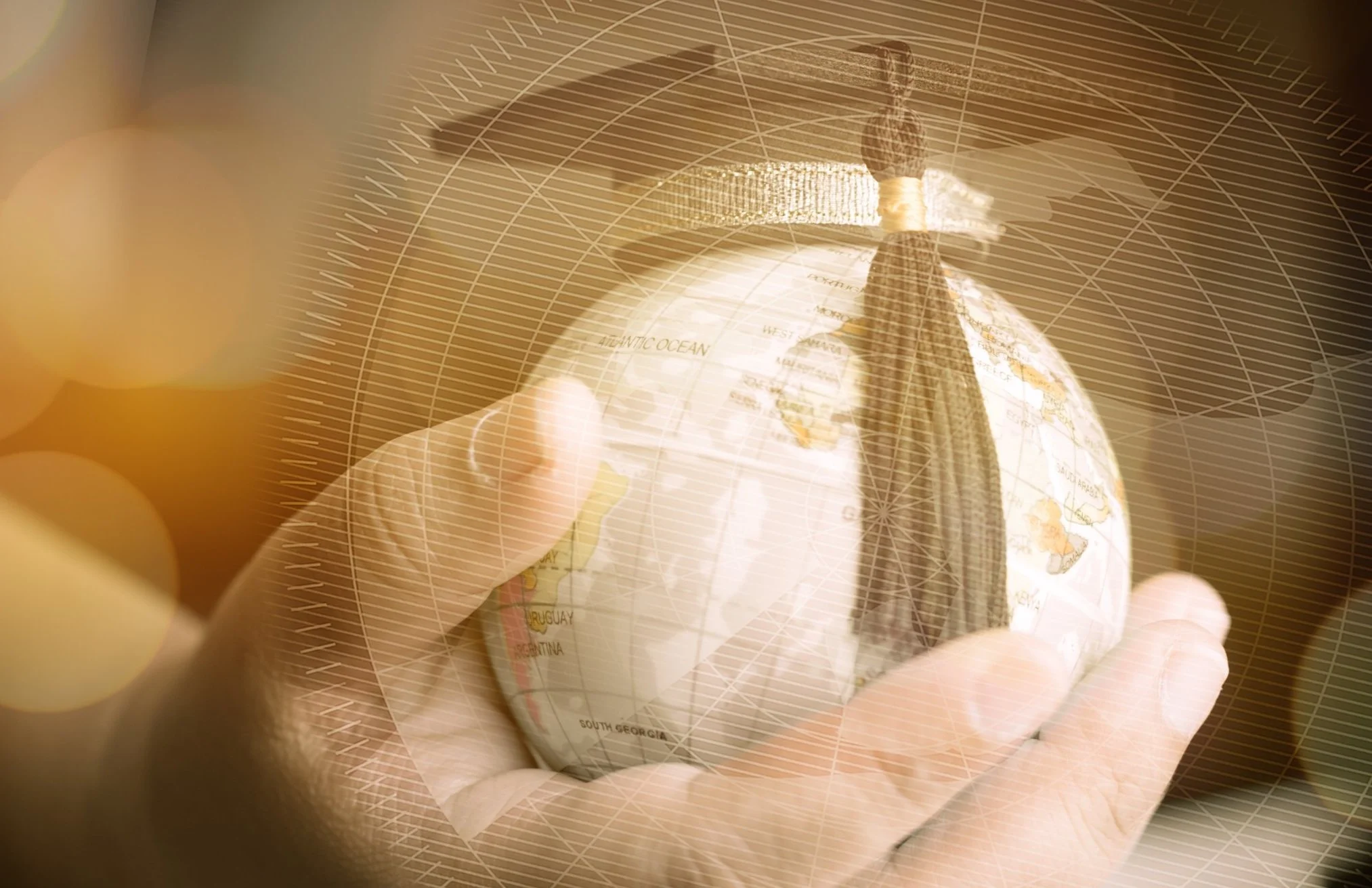 A person pointing at a world map overlay with latitude and longitude lines, with a focus on South America, specifically Uruguay and Argentina, projected over the person's face and hand.