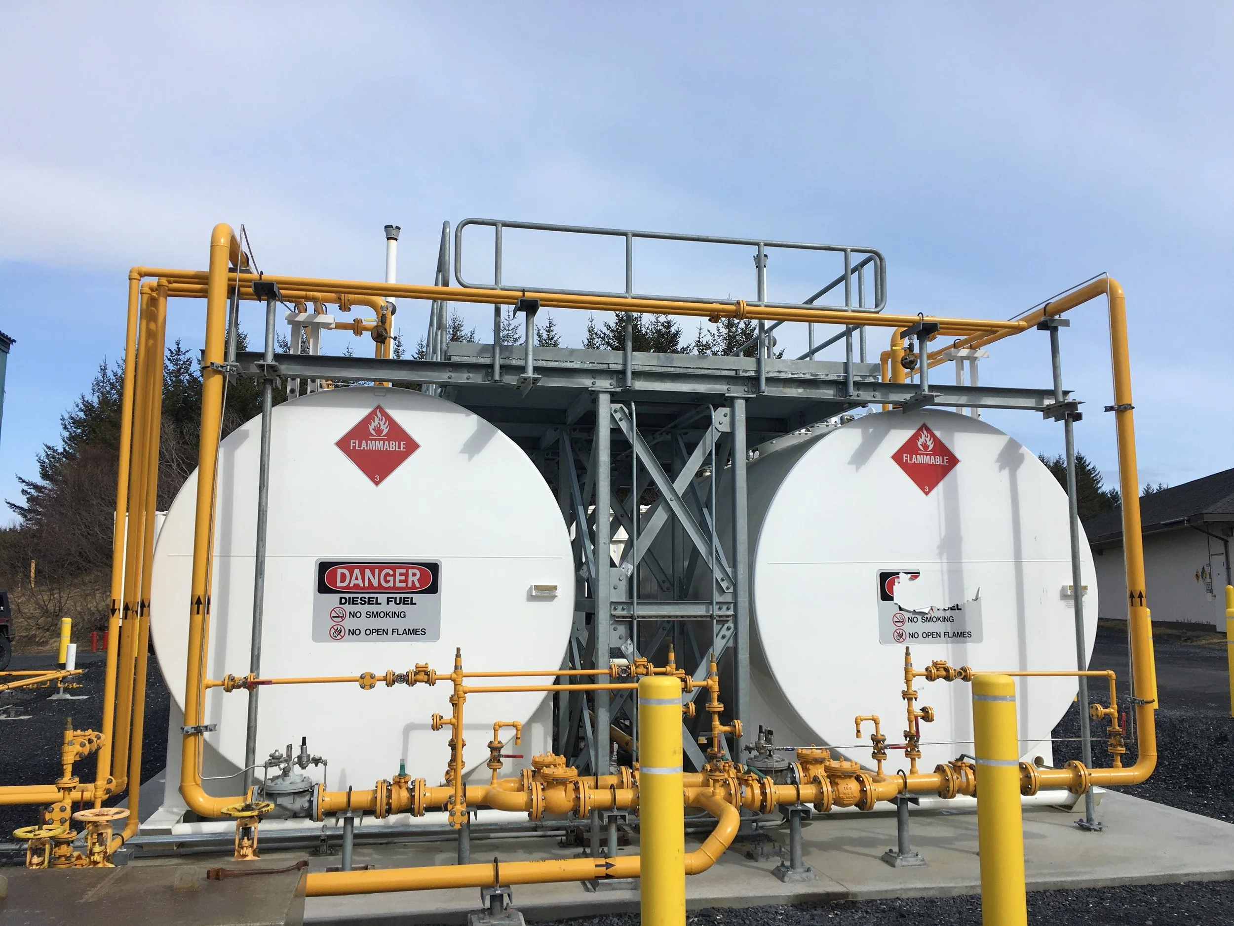 Fuel storage tanks with piping and safety systems