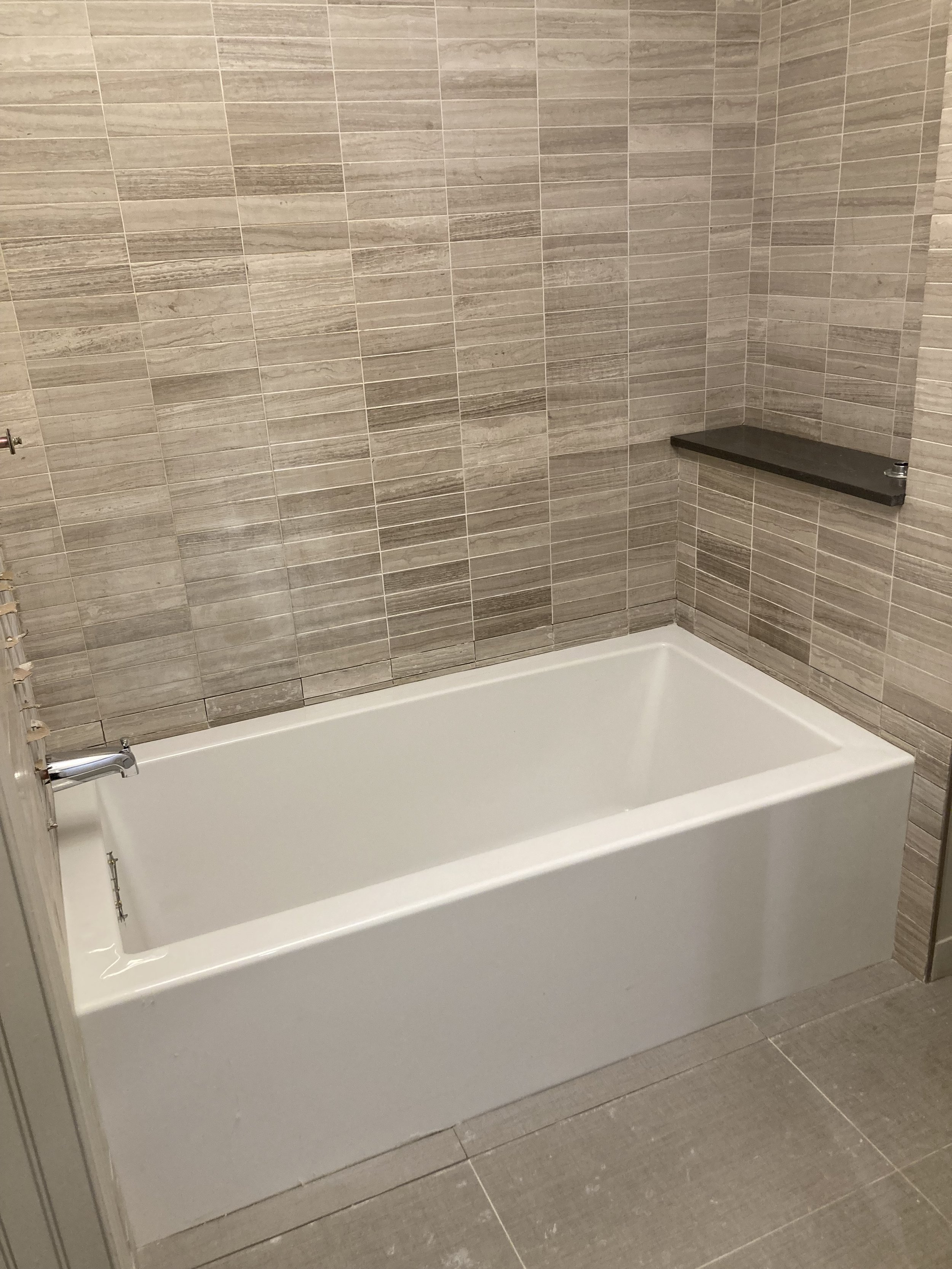 New tub in footprint of shower