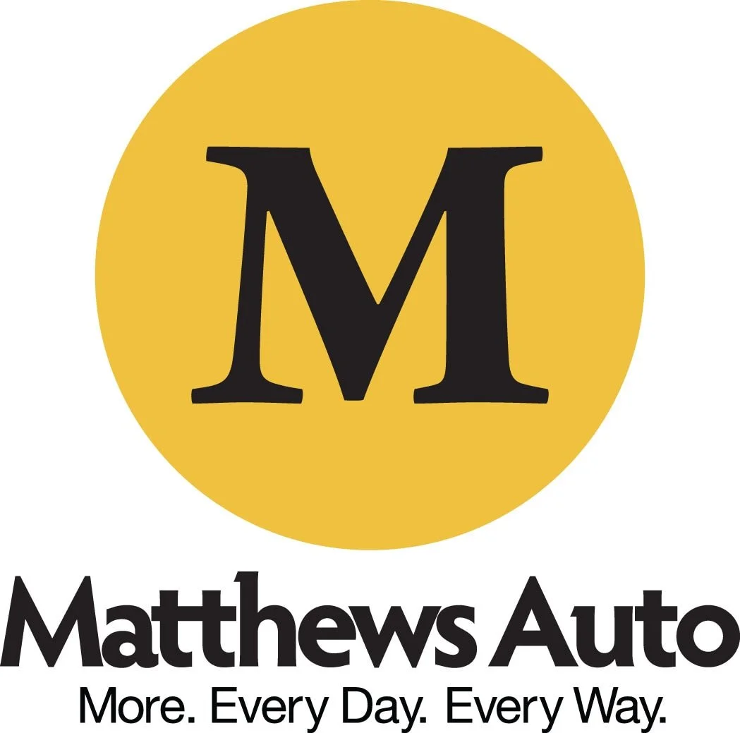 Logo for Matthews Auto with a large black letter M inside a gold circle and the text 'Matthews Auto' below, followed by the slogan 'More. Every Day. Every Way.'