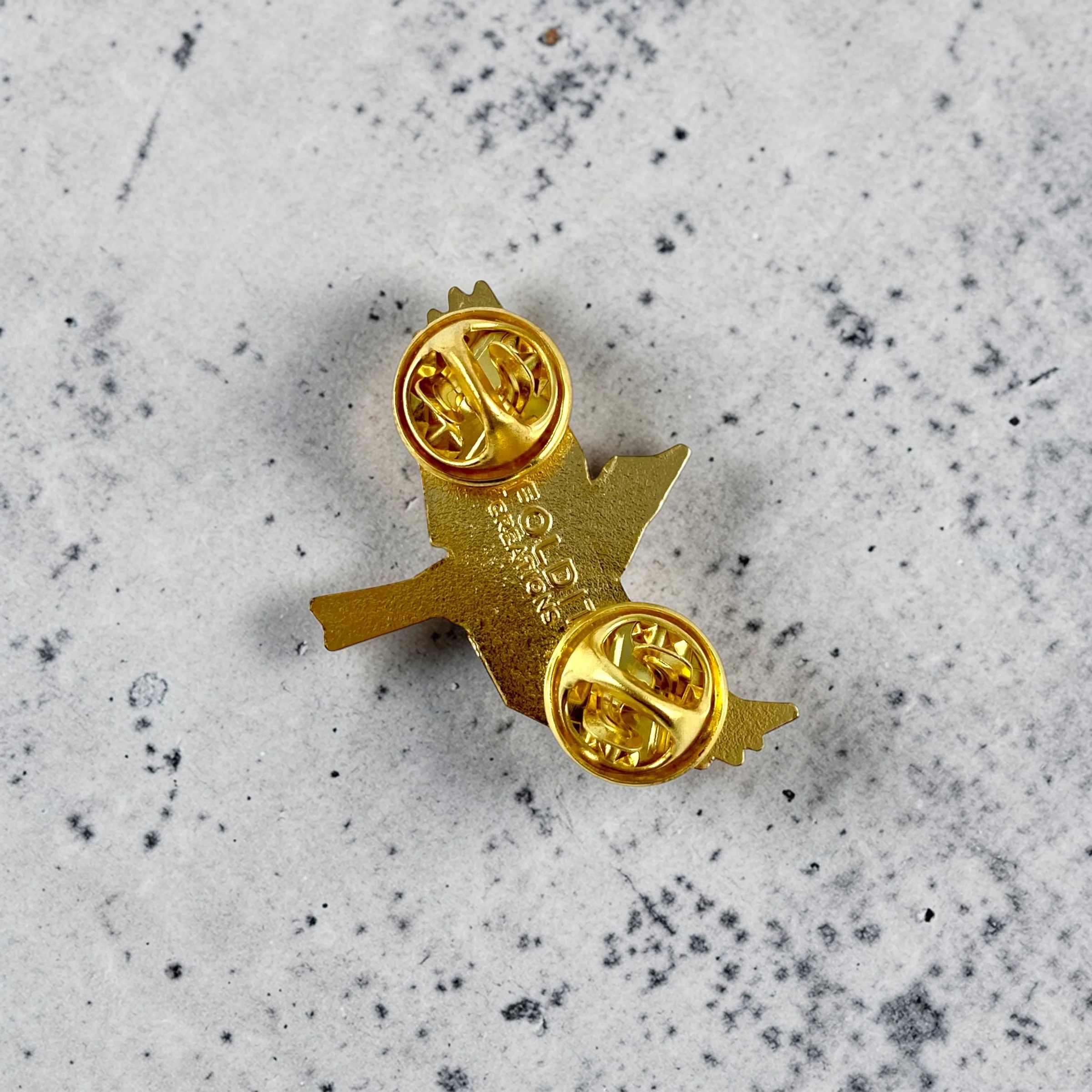 Baltimore Oriole enamel pin – a unique bird themed gift for bird lovers and backyard bird watchers. Hard enamel pin with secure double pin backing and original FoldIT Creations design.