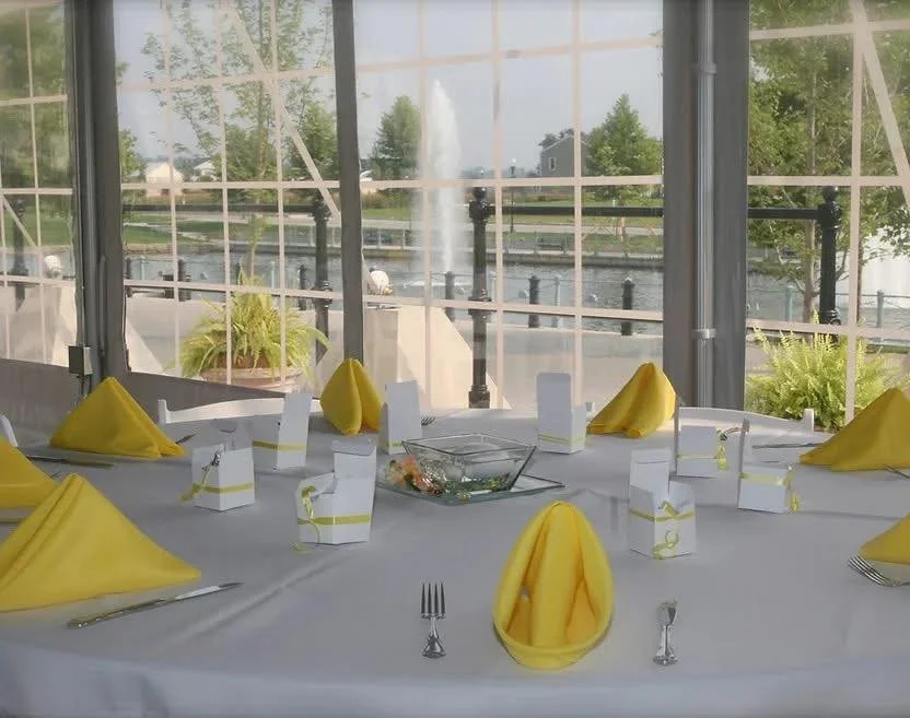 Yellow Wedding Decor Setup in Event Tent overlooking New Town St. Charles Canals.jpg