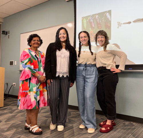 Four women standing together