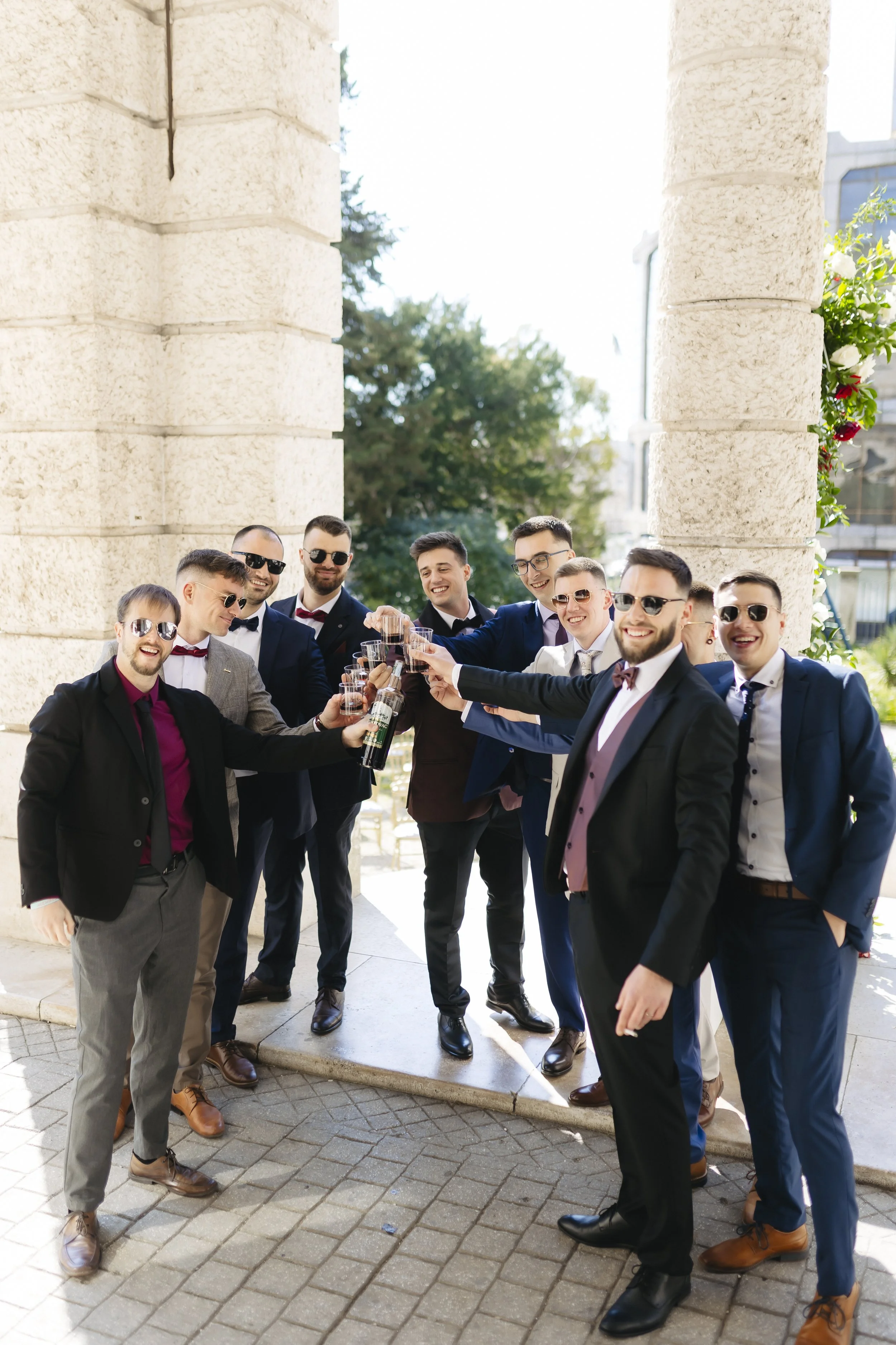 weddinginpula_groomsmenmakingatost.jpg