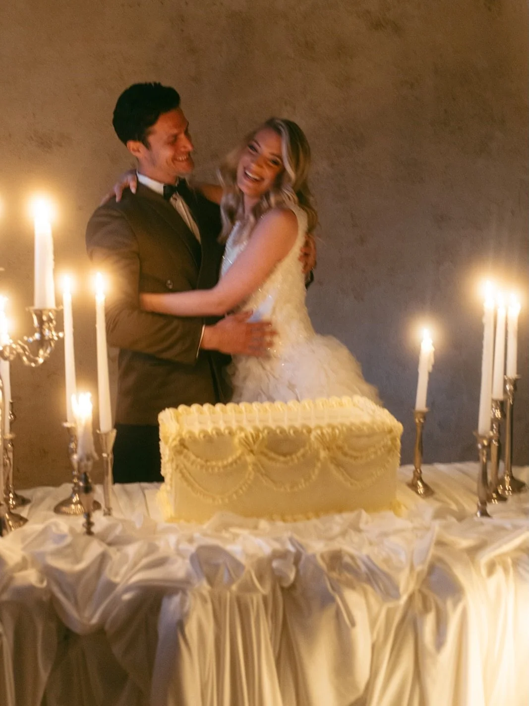 From sunlight on stone to candlelight on silk. The final, moody chapter at @castlebelaj featuring silver candelabras, draped textures, and a vintage cake setup that defines romantic luxury.

Creative Team:
Planner: @eventus_weddingsandevents weddings