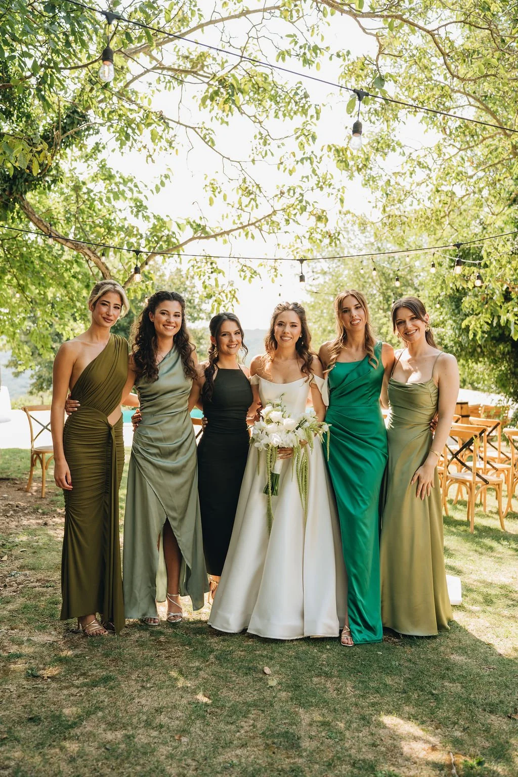 bride-and-bridesmaids-green-mismatch-dresses (1).jpg