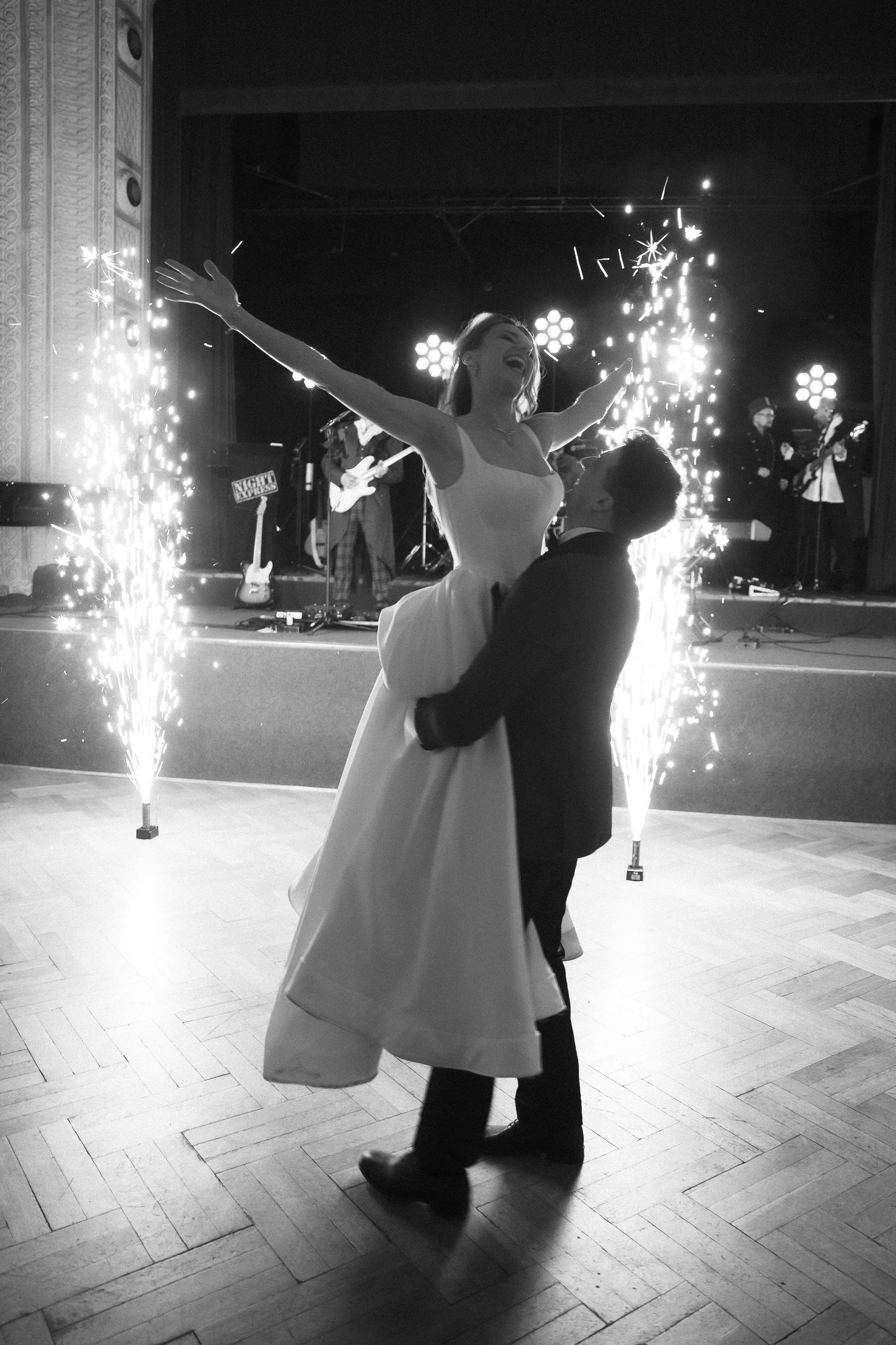 first-dance-lift-pula-ballroom-wedding-sprinklers.jpg