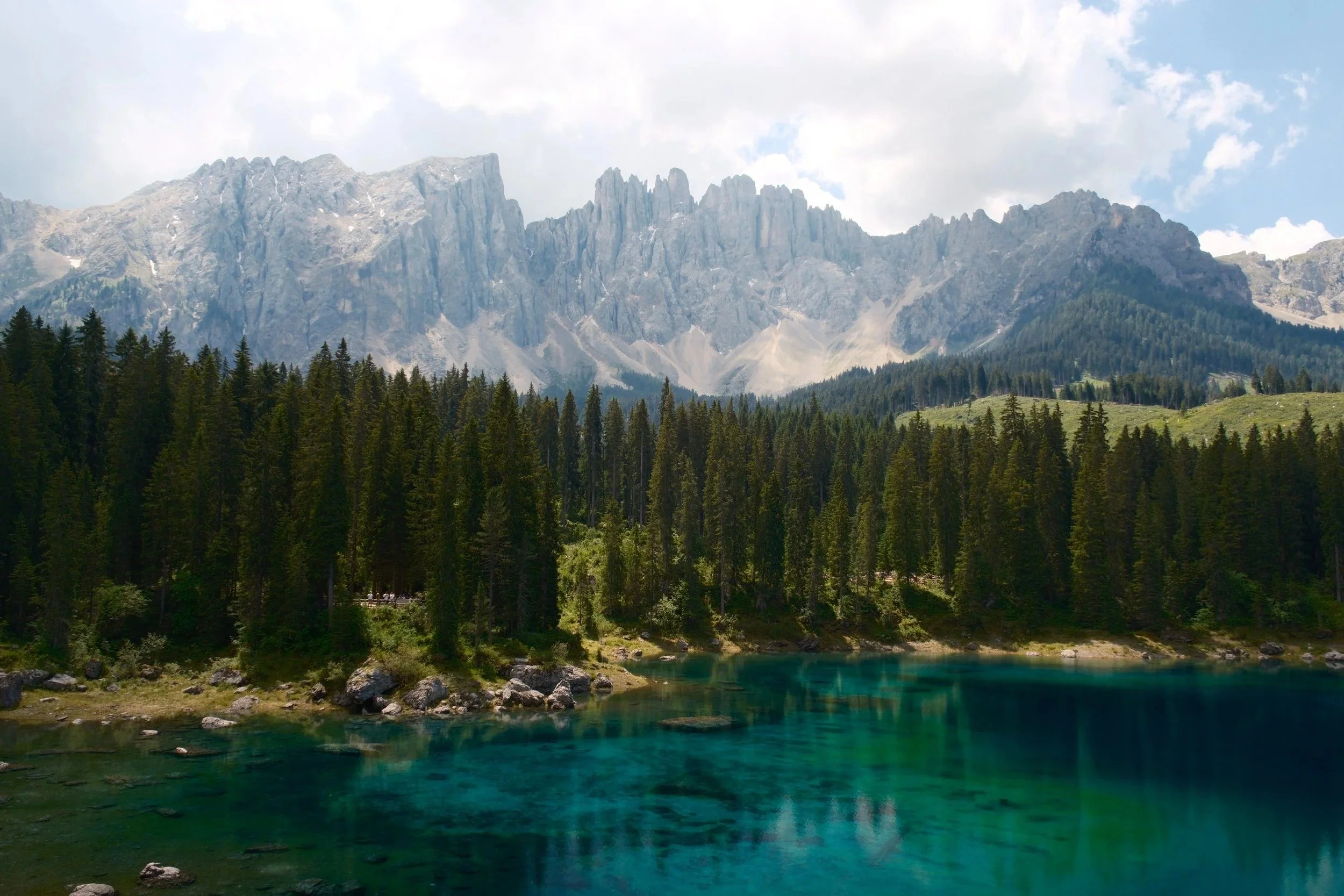 Lago di Carezza with turquoise water below the Latemar peaks, Dolomites, Italy - fine art print by Zyan Sachs