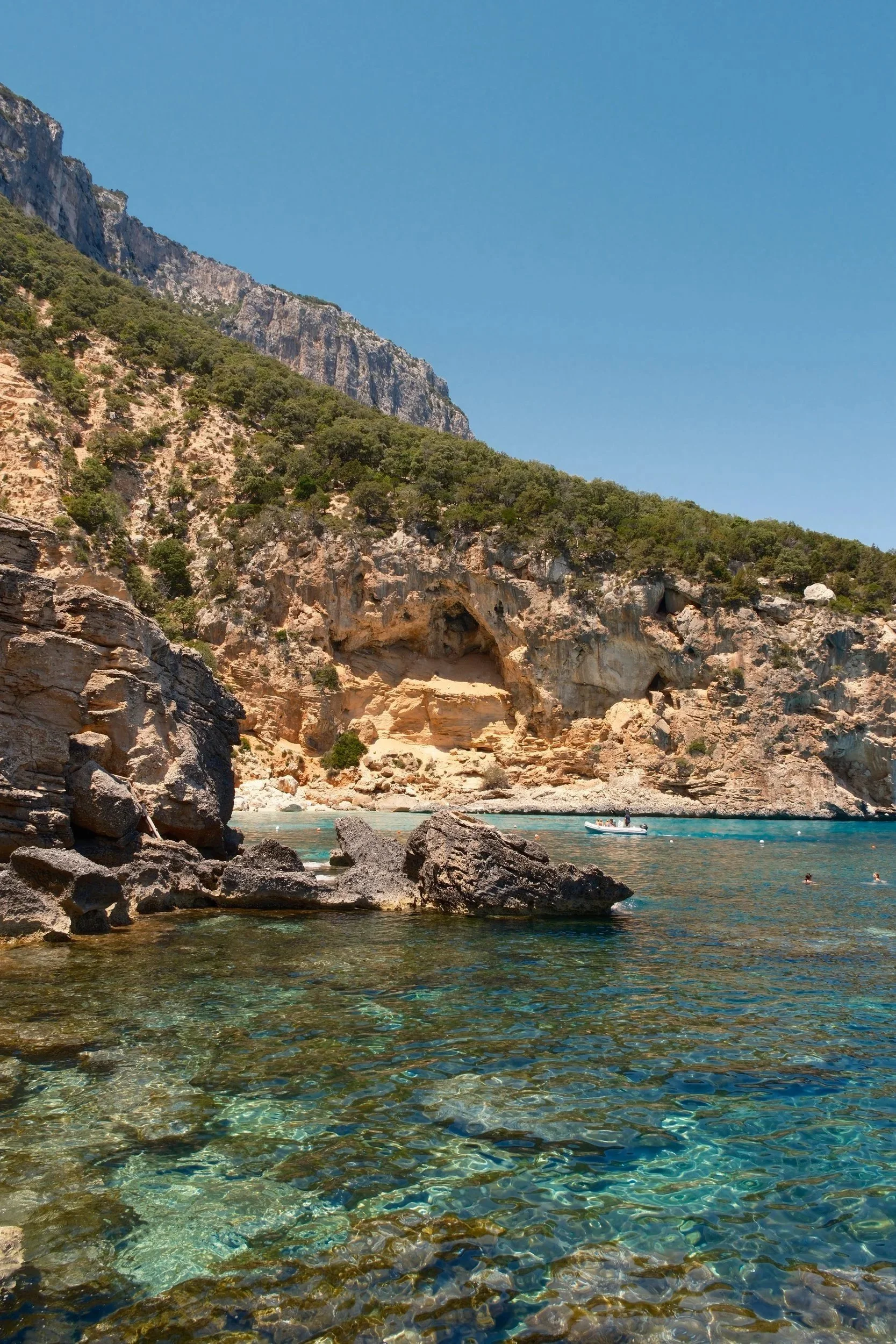 sardinia-cove-cliffs-clear-water-zyan-sachs.jpg
