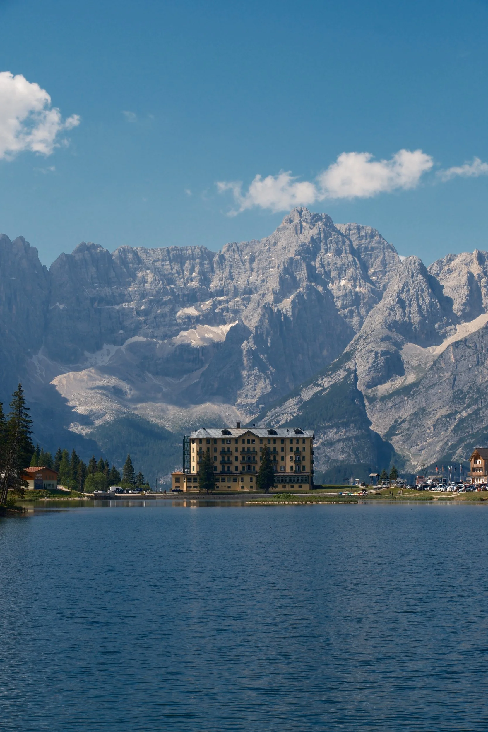Grand Hotel Misurina on the shore of Lago di Misurina below the Sorapiss massif, Dolomites, Italy, by Zyan Sachs