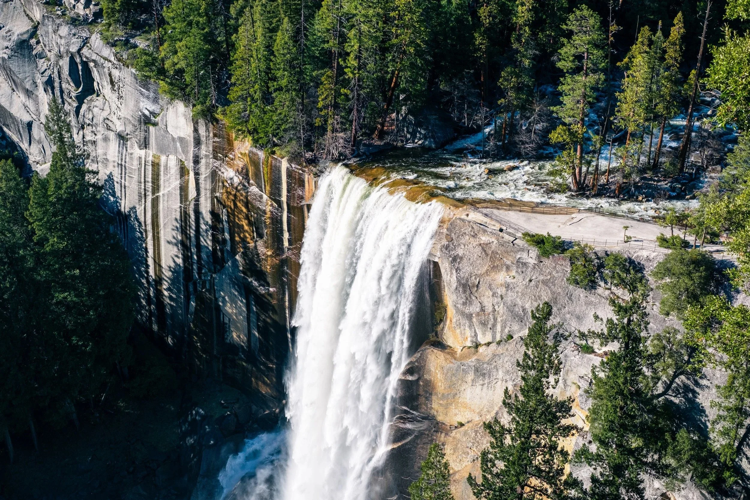 Vernal Fall cascading down a granite cliff, Yosemite National Park, California - travel photography and fine art prints by Zyan Sachs