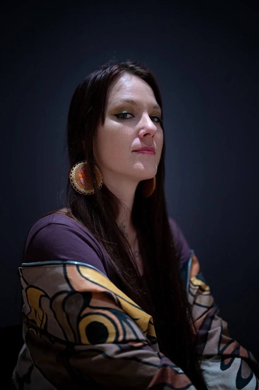 Headshot of an artist.