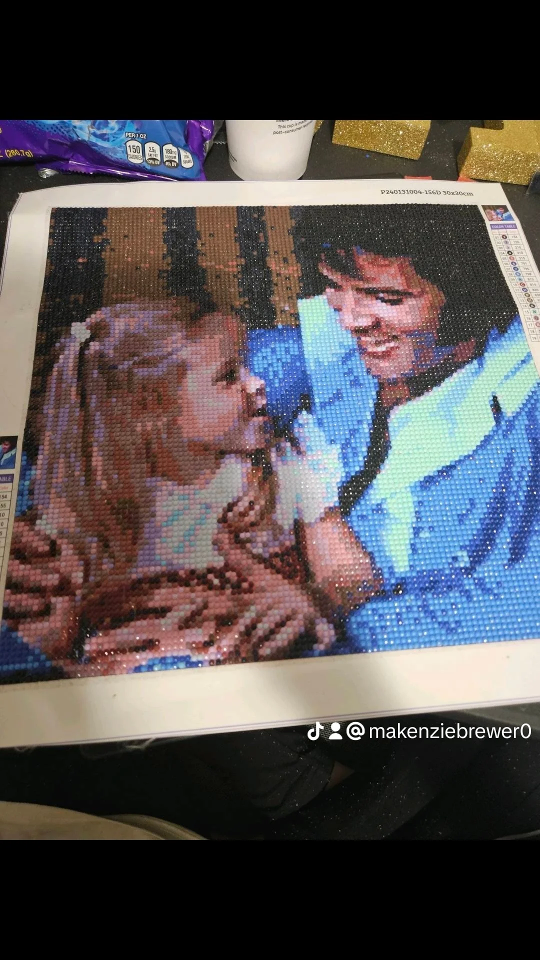 Diamond painting of Elvis and Lisa Marie Presley smiling