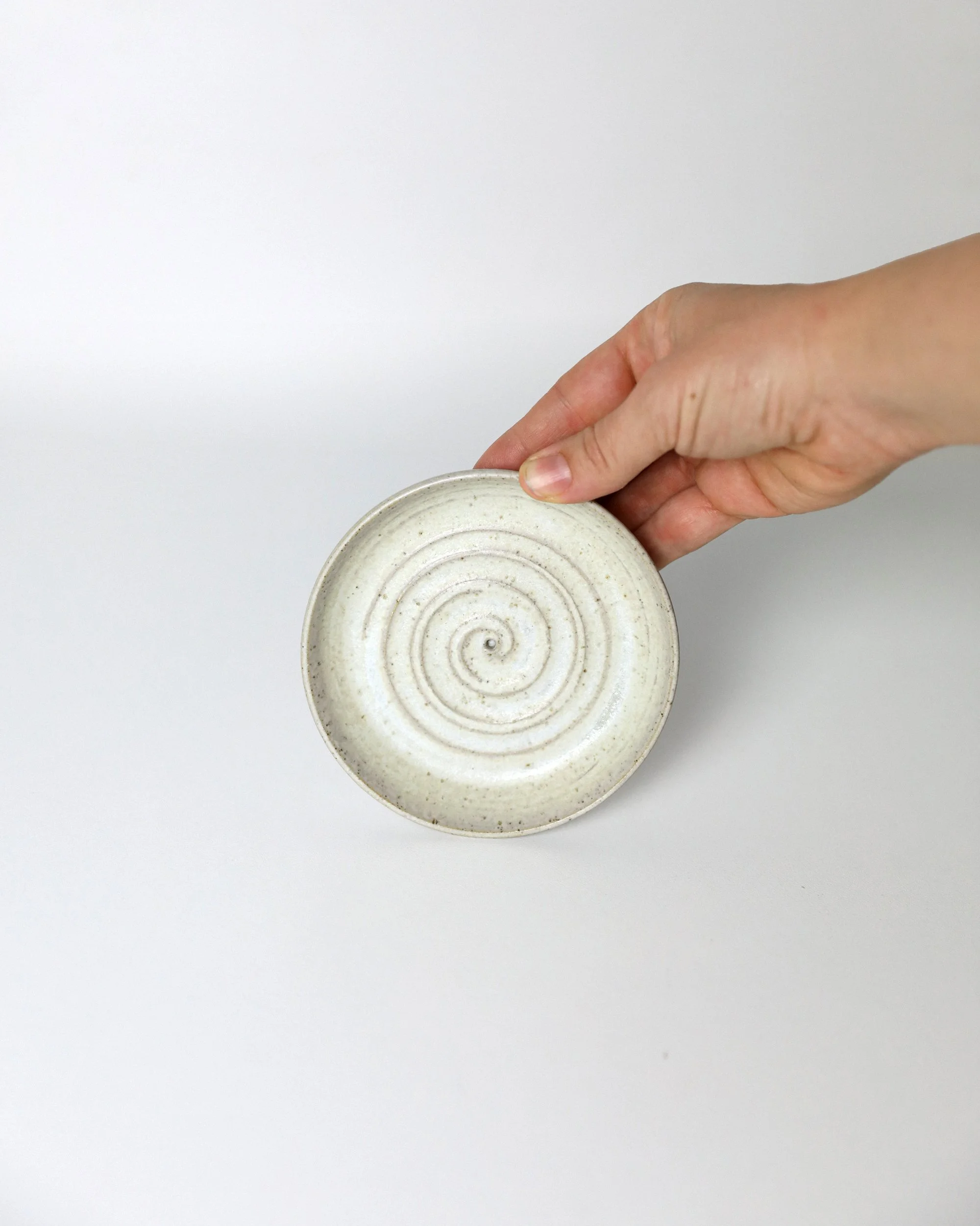 Holding-Spiral-Shot.jpg