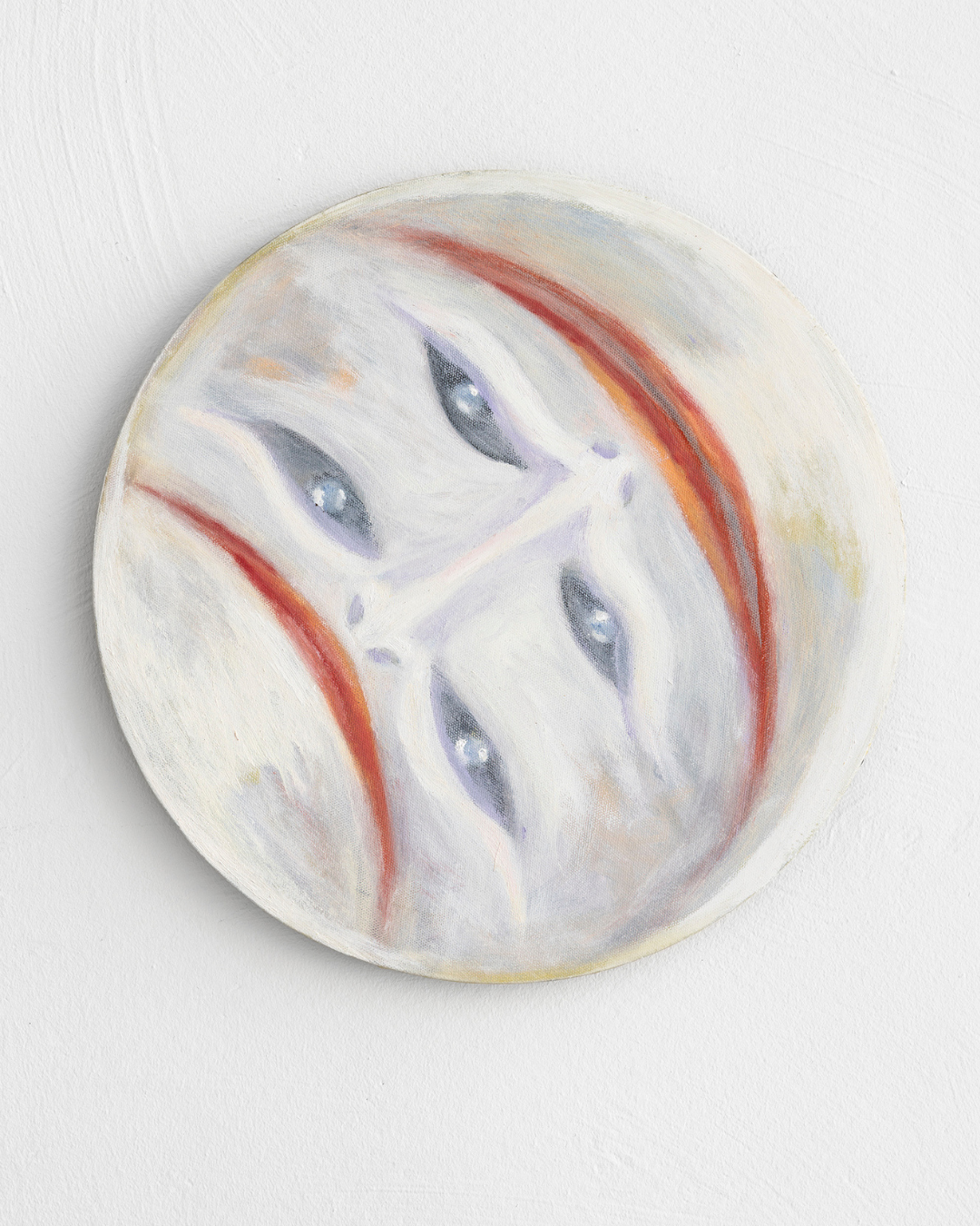 Circle painting with a sad and happy face by Danish artist Kristoffer Bech