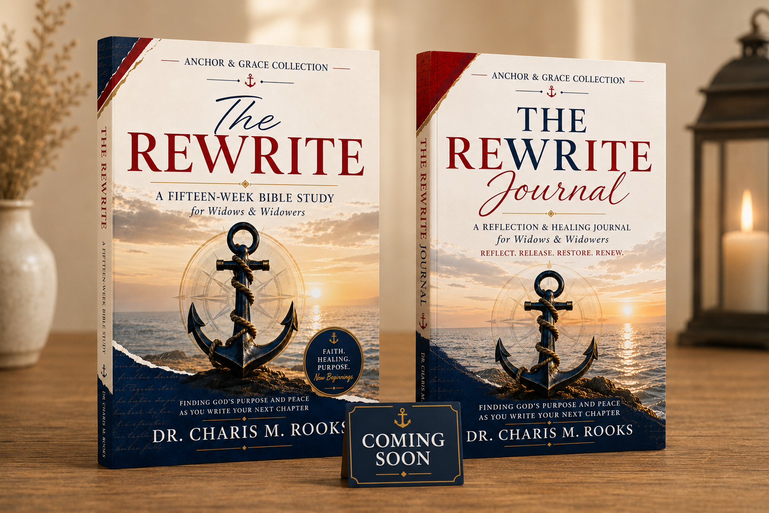 Two books titled "The Rewrite" and "The Rewrite Journal" standing on a wooden table, with a small sign that says "Coming Soon" in front of them. The books have nautical-themed covers featuring an anchor against a sunset over the ocean.