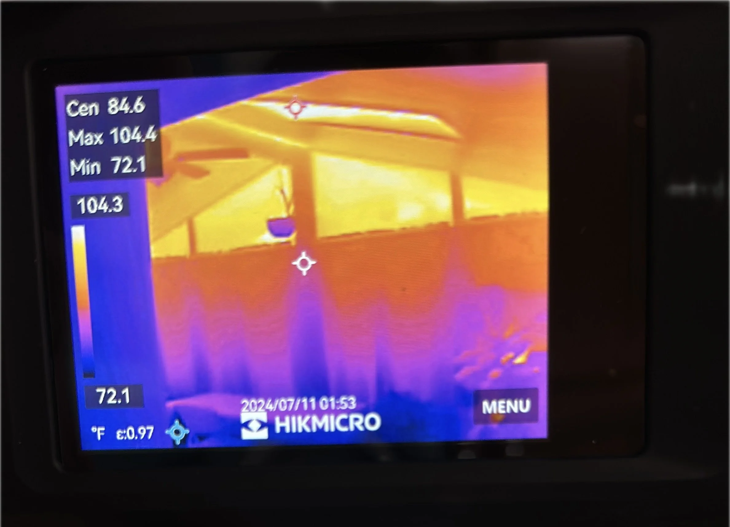 Using a thermal imaging camera during a home inspection.