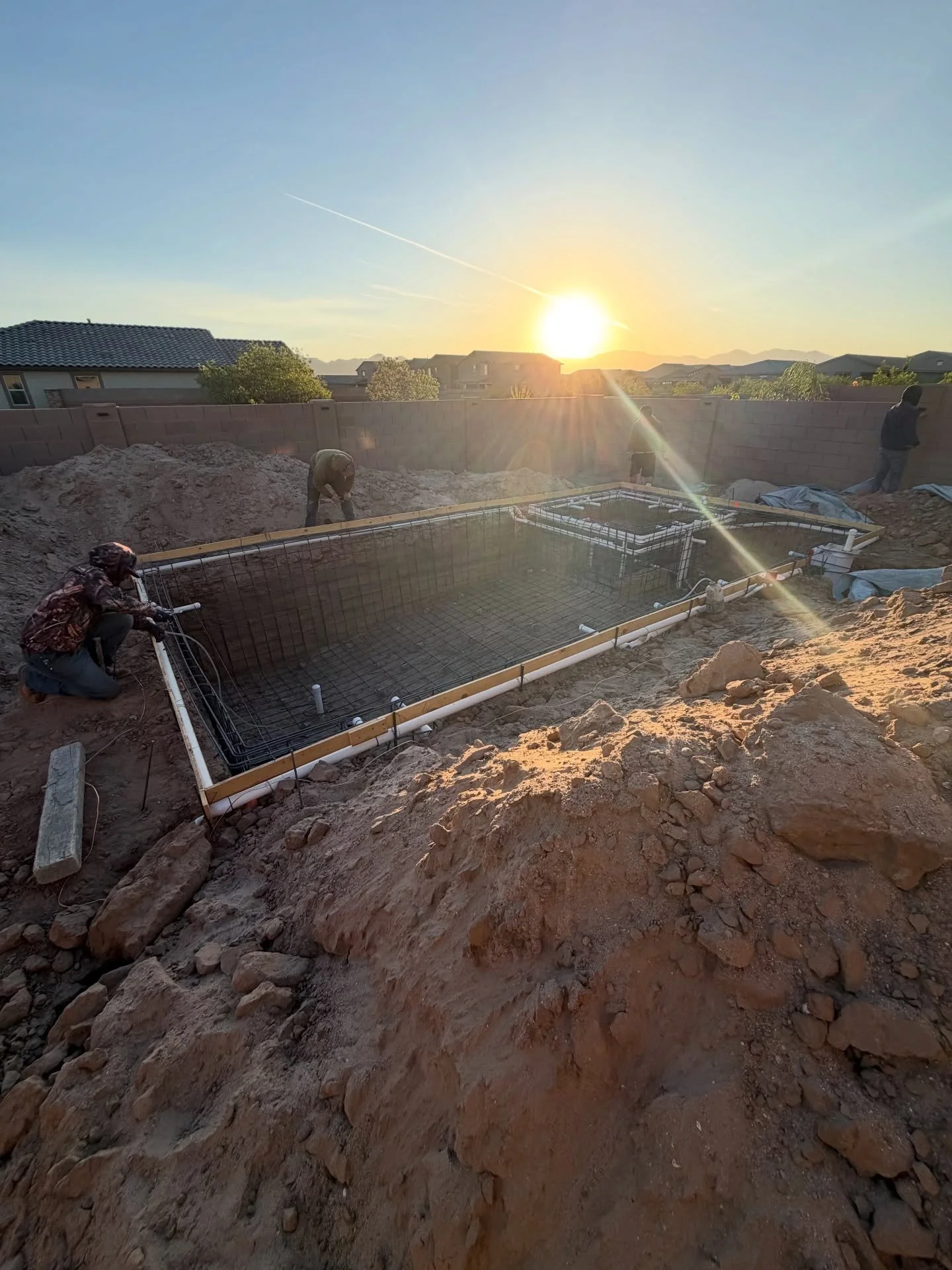 Hard to beat Arizona sunrises from the jobsite. 🌅

Starting the shotcrete phase on this Gladden Farms project with reinforced steel and fibered shotcrete to make sure this pool is built to last. This is where the structure comes to life.

We love wh
