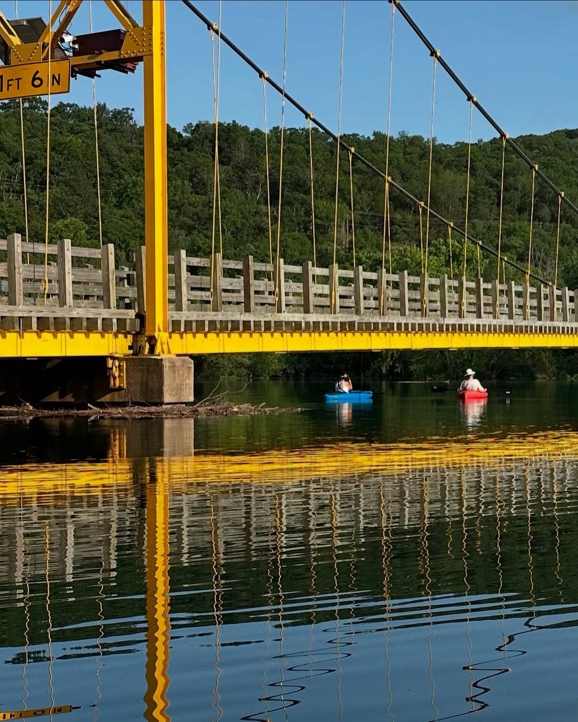 Rising rain waters may soon submerge our little golden gate bridge. The magic of the natural state &hellip; kayaking beside an old train trestle, through trees at golden hour. peaceful + quiet, sweet moments with friends.

#water #nature #kayak #onth