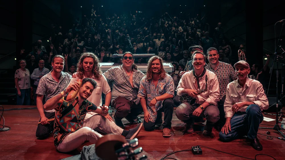 ¡Tumbao! on stage in Lima with the crowd