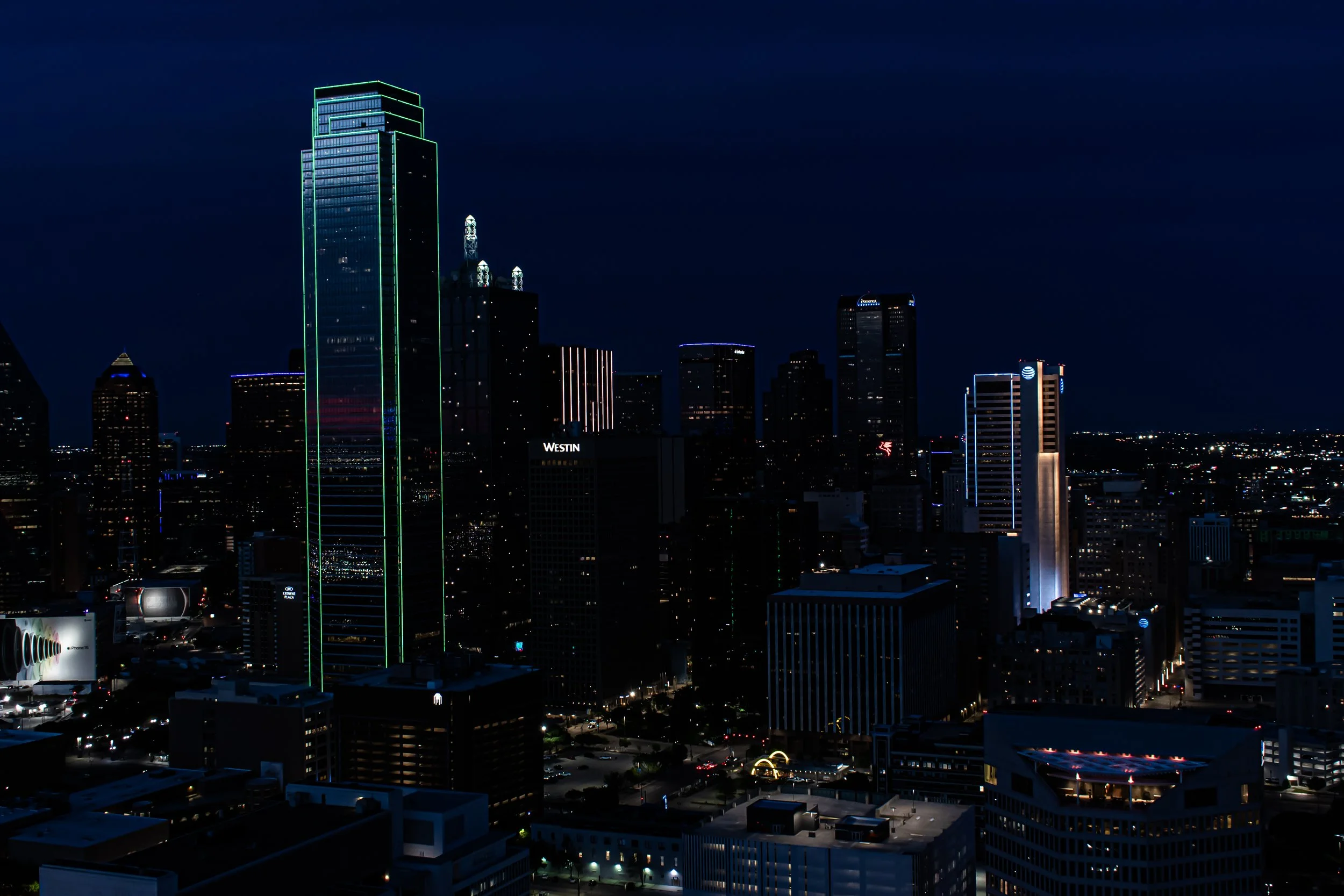 Night view of downtown Dallas shot from the GeO-Deck of Reunion Tower. Shot 5 Apr 2024.