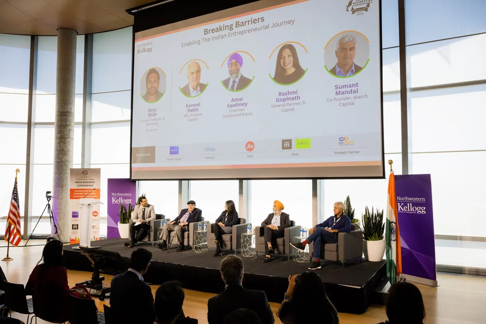 Birju Shah speaking on a panel at the Kellogg India Business Conference 2024