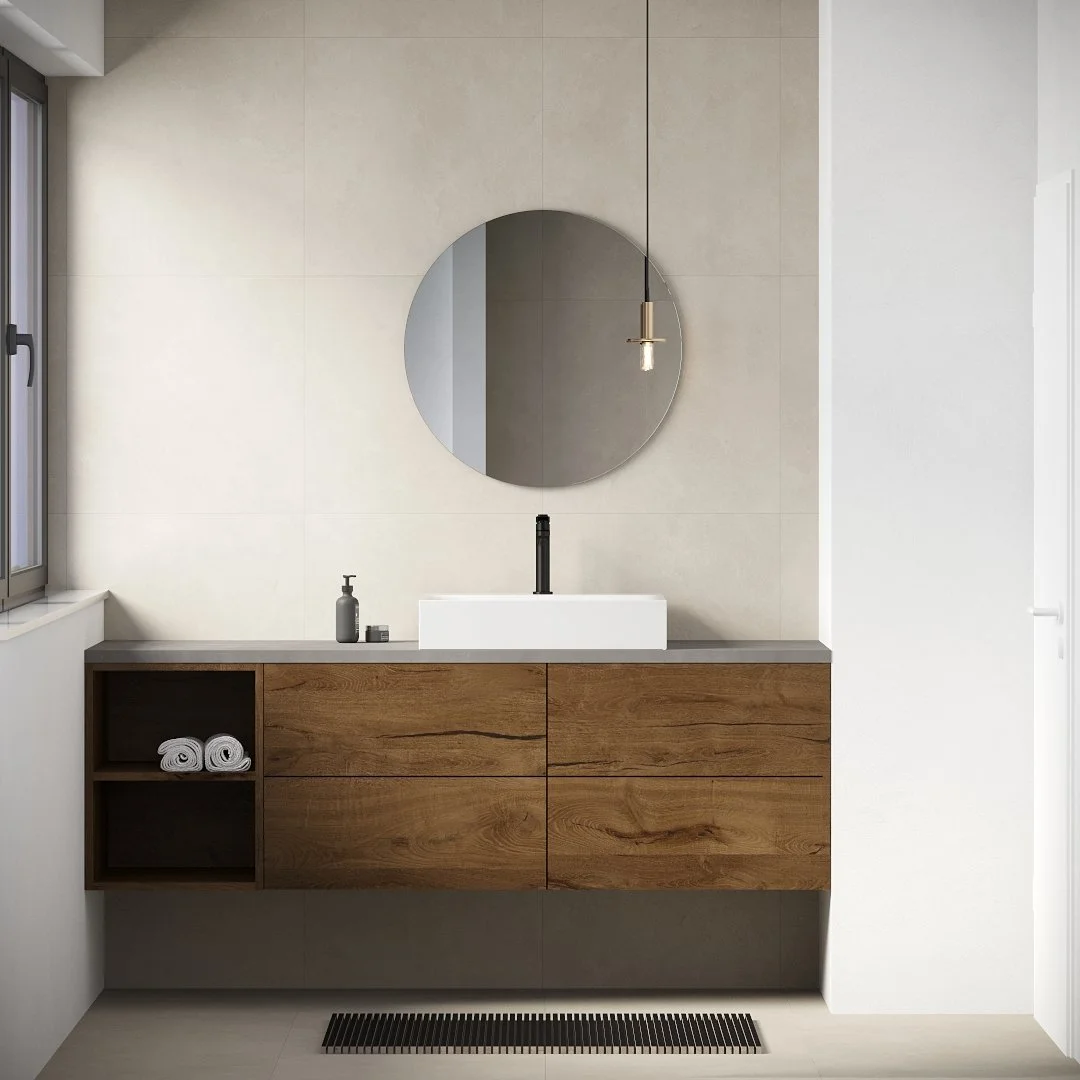 Moderner Badezimmerwaschbecken mit Holzschrank, runder Spiegel und minimalistischem Design.