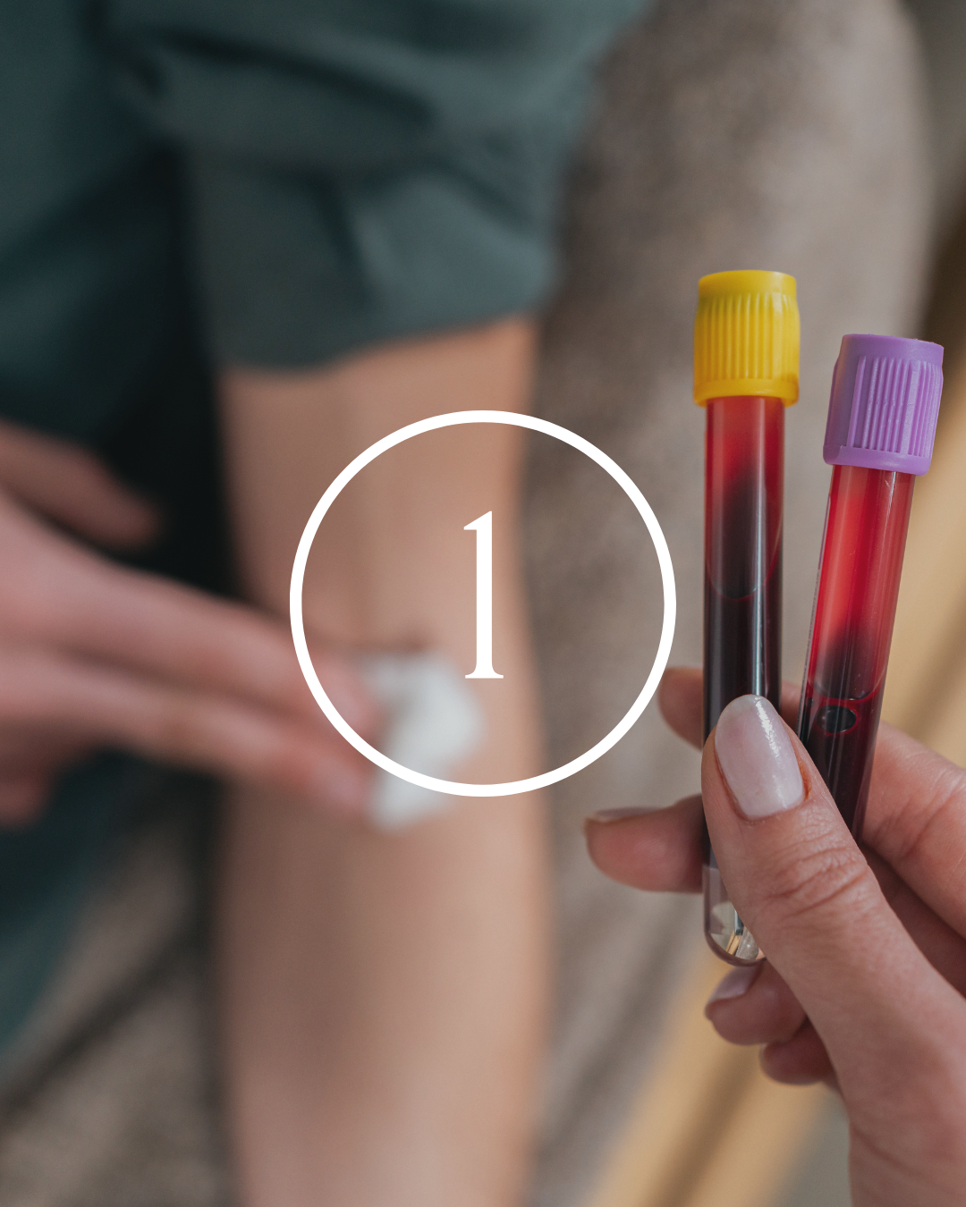 A person holding two blood collection tubes with yellow and purple caps near a person's arm, who is in the process of getting a blood test.